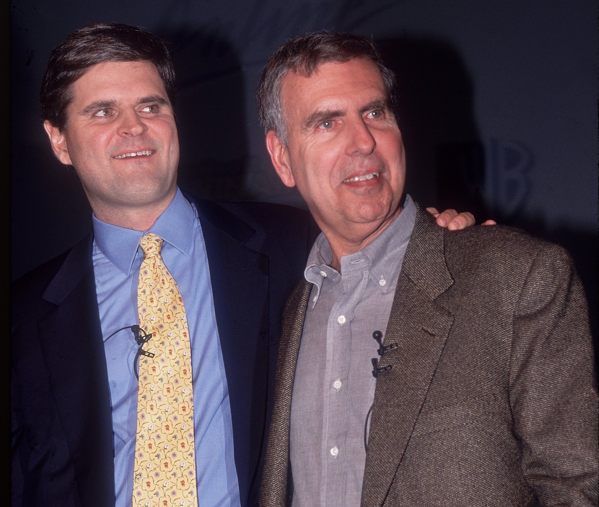 Steve Case in a tie, Jerry Levin without a tie.