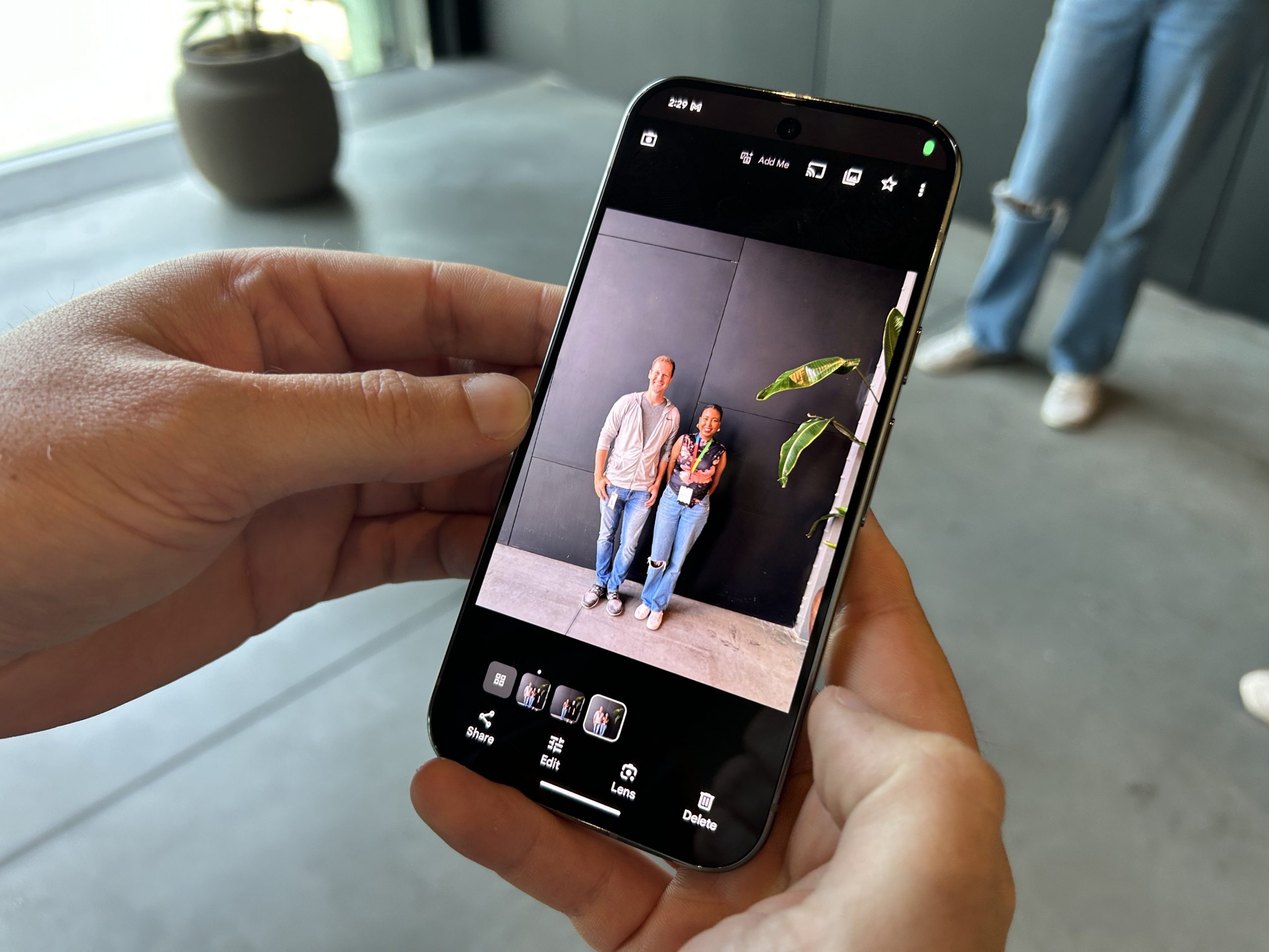 Google Pixel phone showing a photo of two people standing next to each other