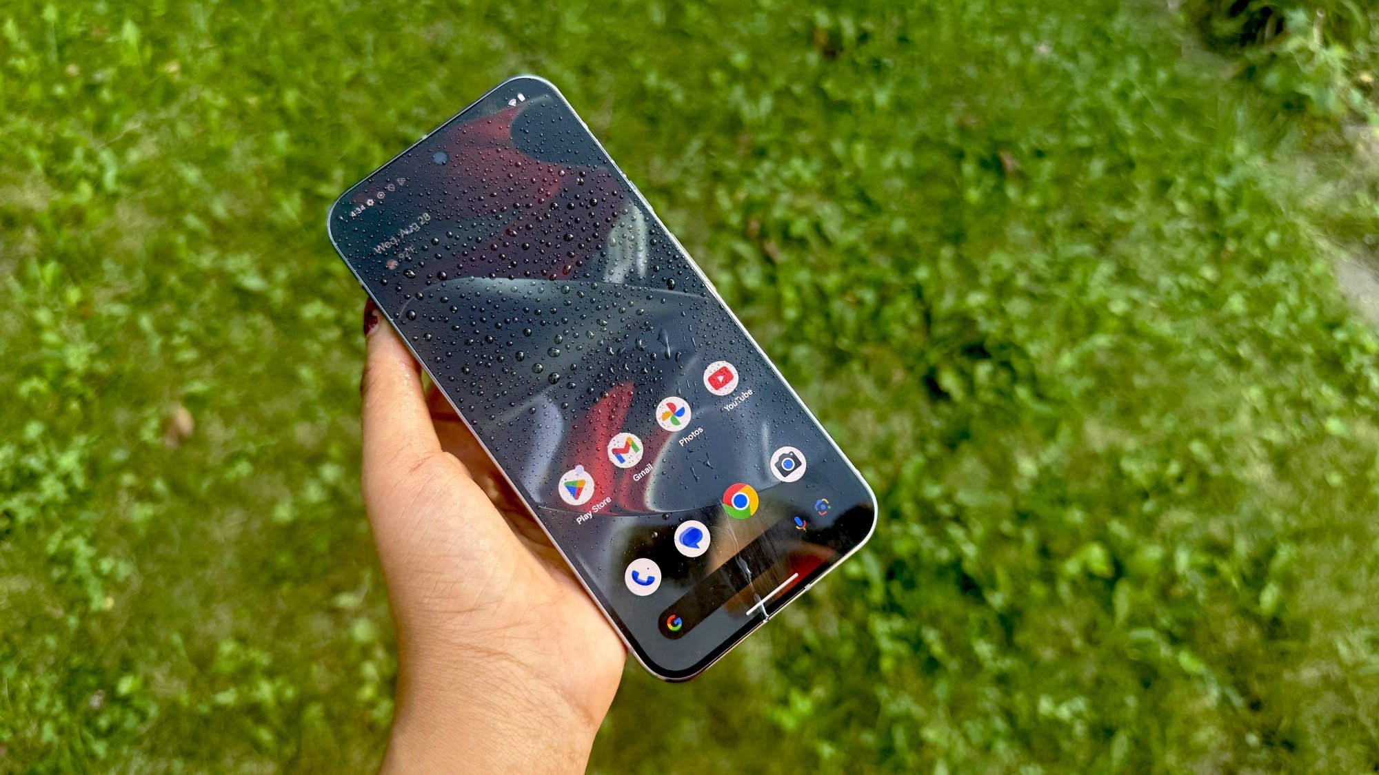 Woman holding Pixel 9 Pro XL