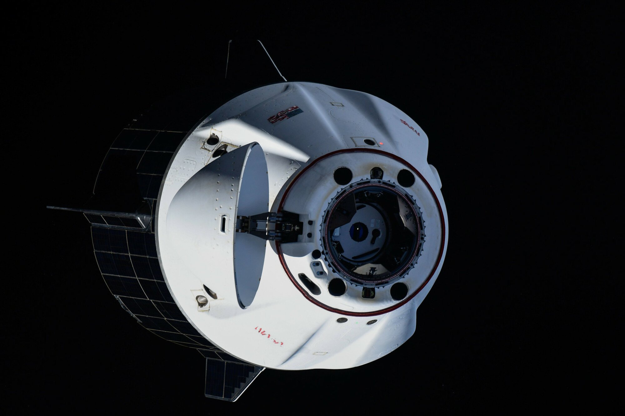 SpaceX Dragon spacecraft backing away from International Space Station