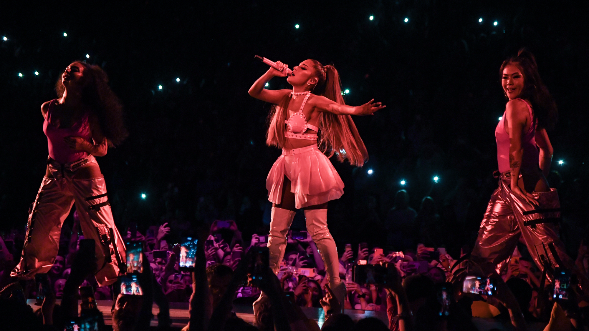 Ariana Grande performs onstage. 