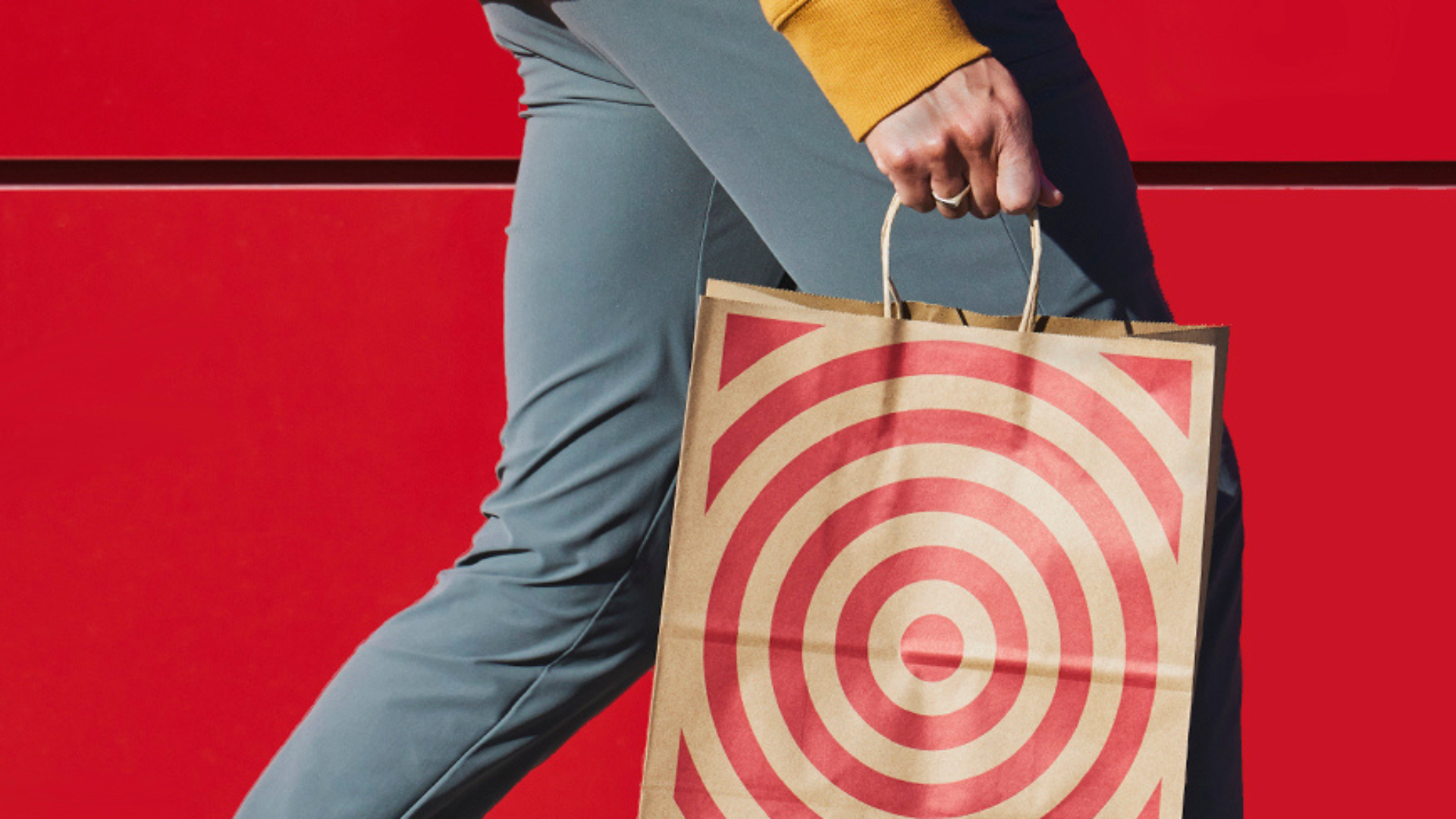 A person carrying a Target shopping bag