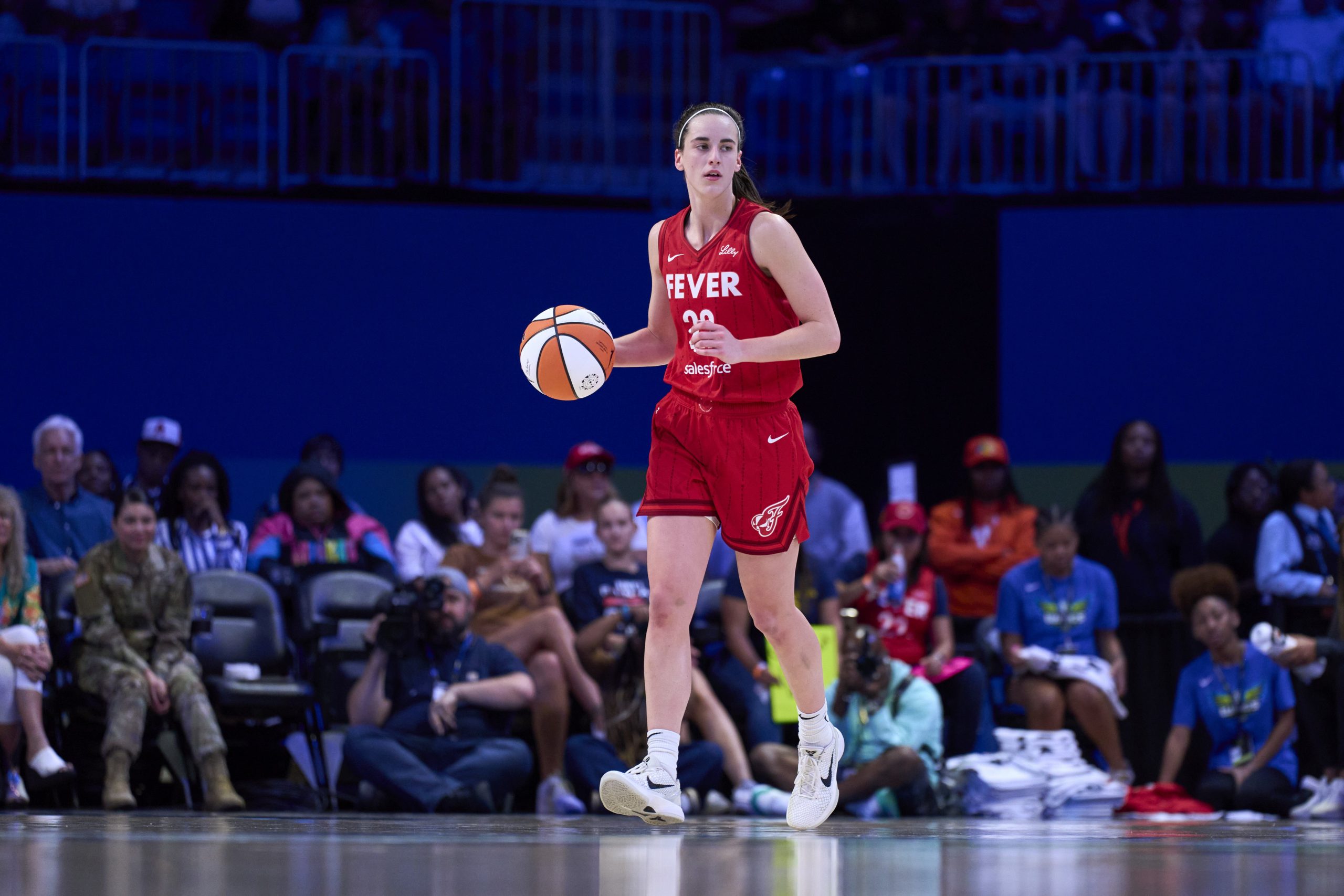 Caitlin Clark of the Indiana Fever brings the ball up court