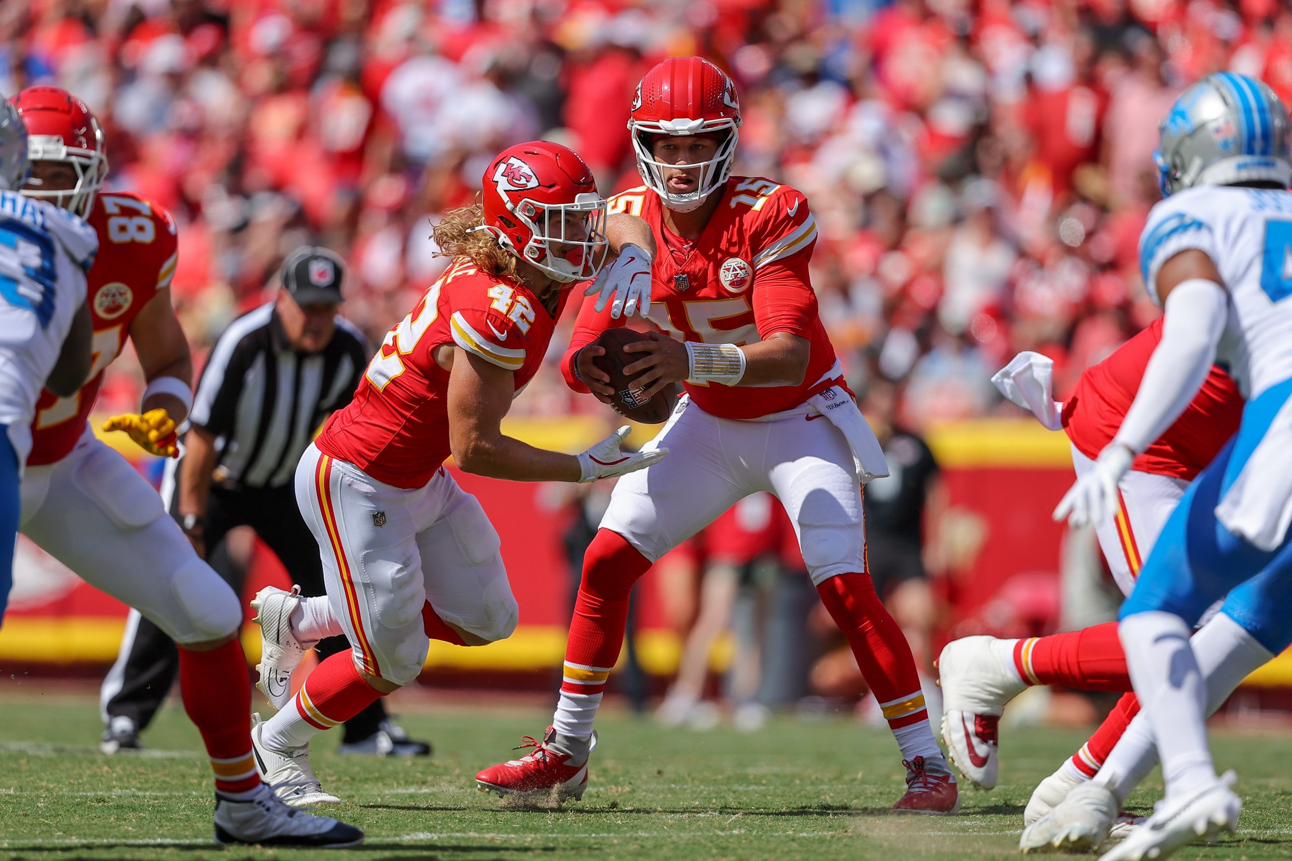 Patrick Mahomes of the Kansas City Chiefs fakes a handoff