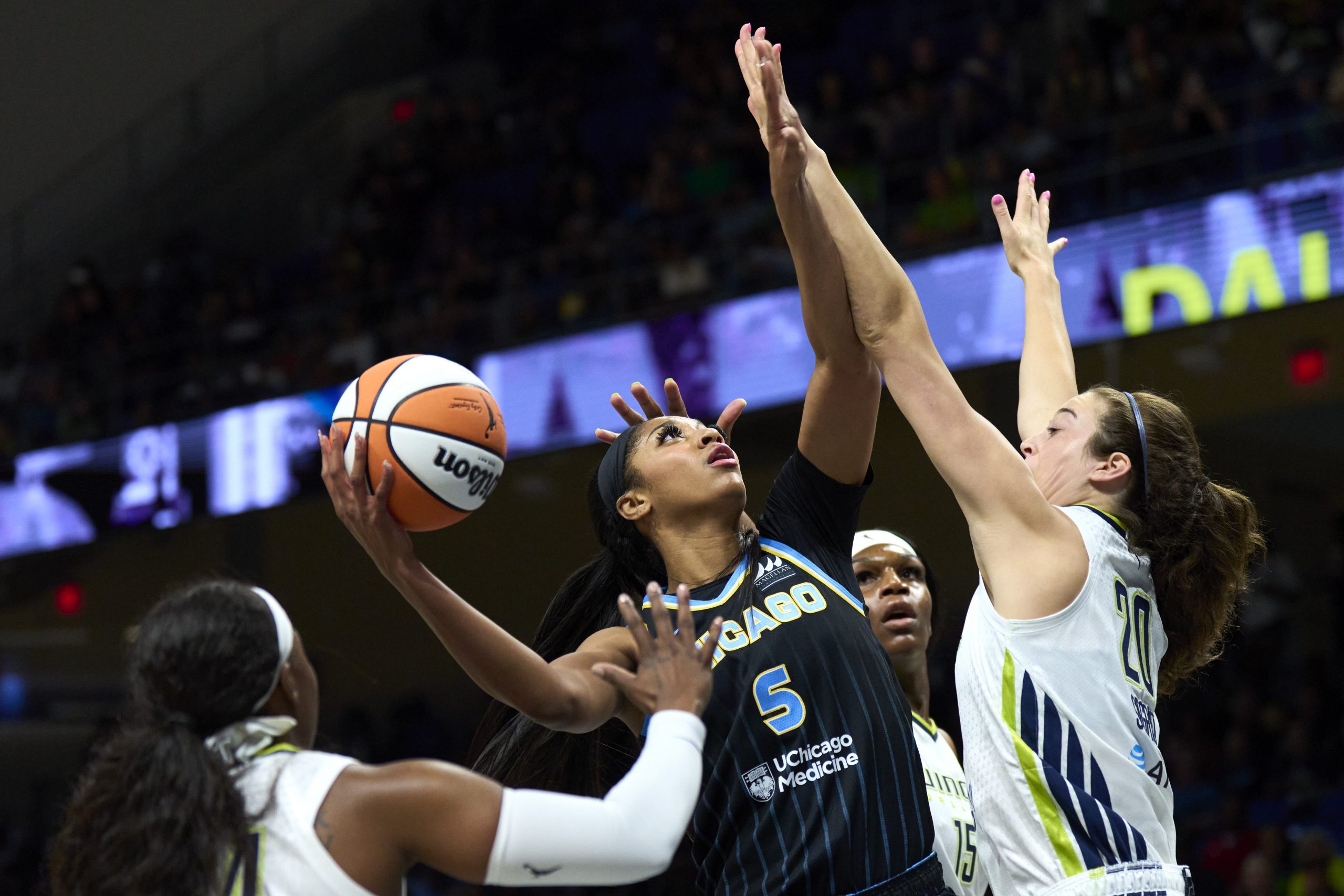 Angel Reese of the Chicago Sky jumps for the basket