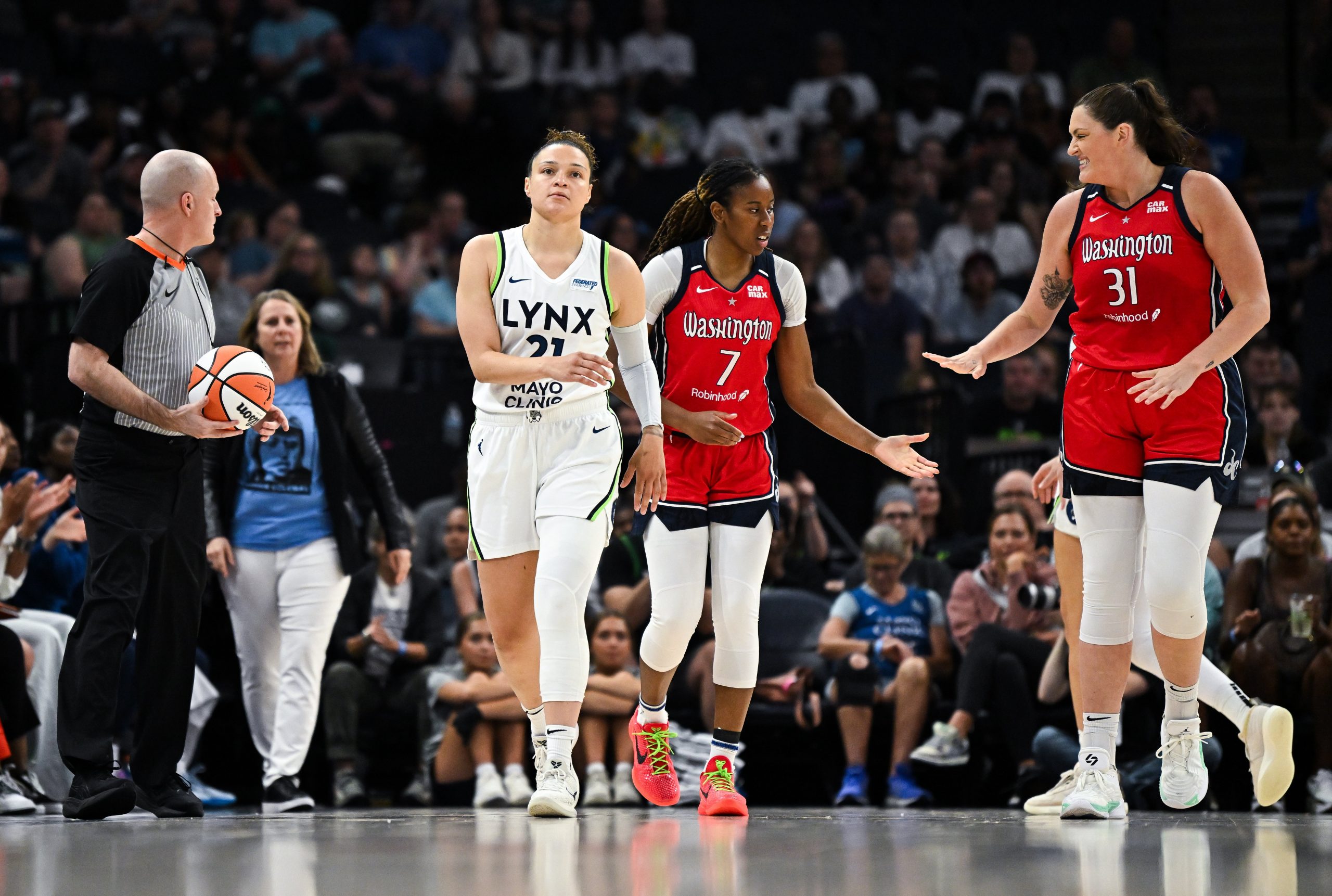 Ariel Atkins and Stefanie Dolson of the Washington Mystics high five