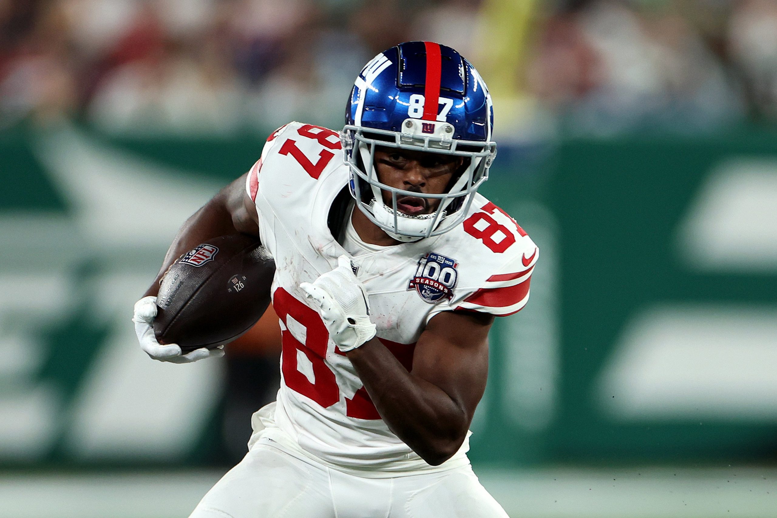 Isaiah McKenzie of the New York Giants runs the ball