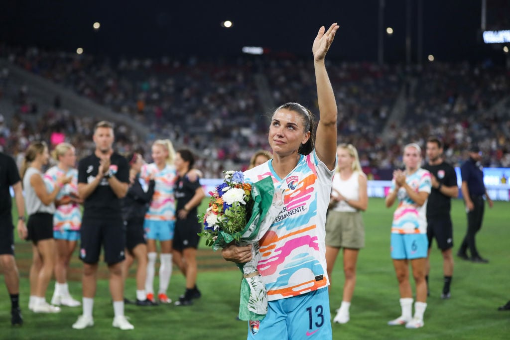 Alex Morgan #13 of San Diego Wave FC waves to fans after the game against North Carolina Courage at Snapdragon Stadium on September 08, 2024 in San Diego, California. 