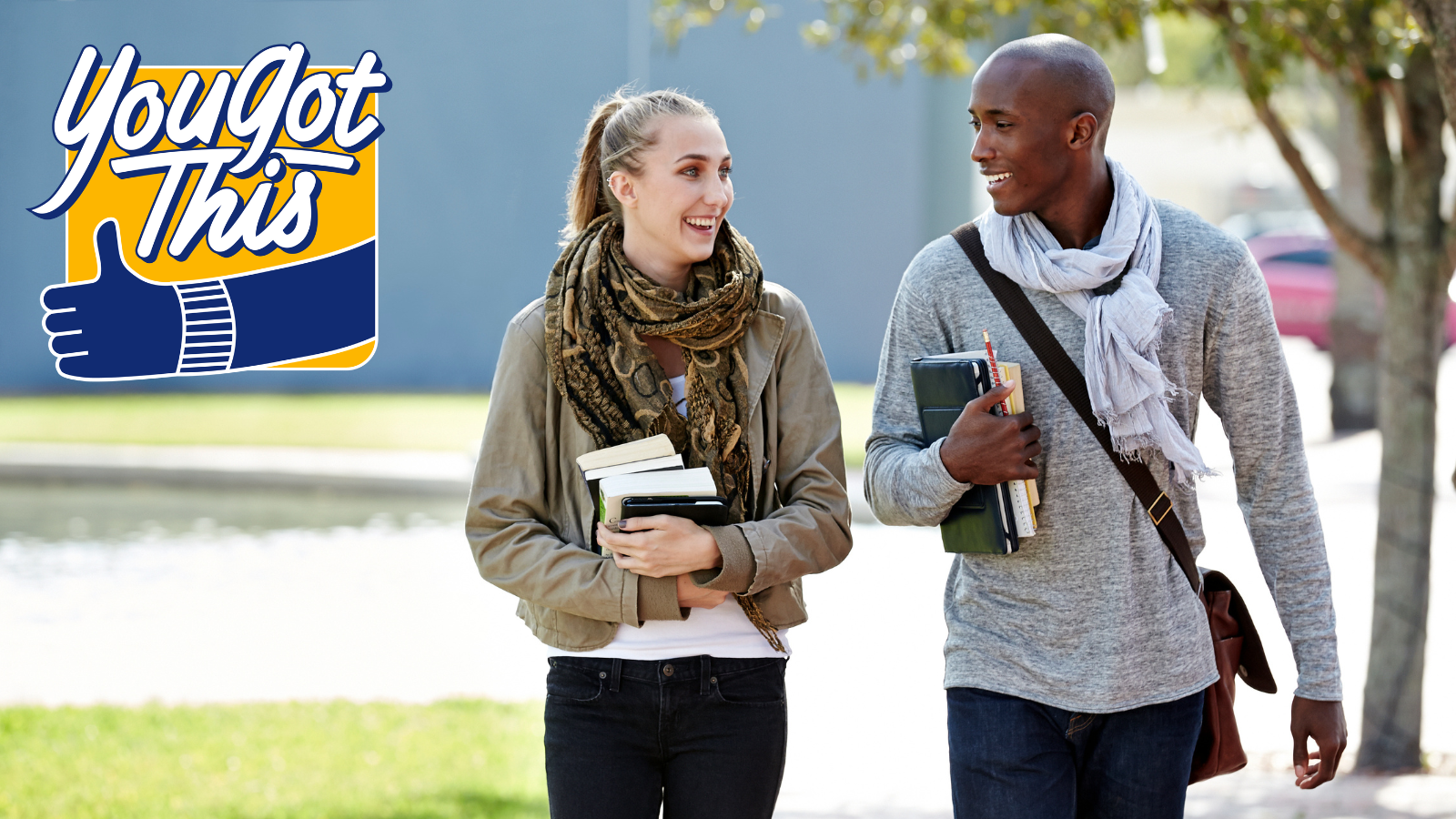 African American boy and white girl at college - stock photo