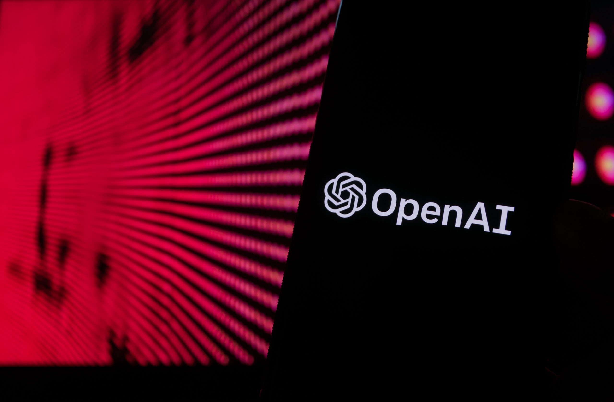 Smartphone with the OpenAI logo on the screen