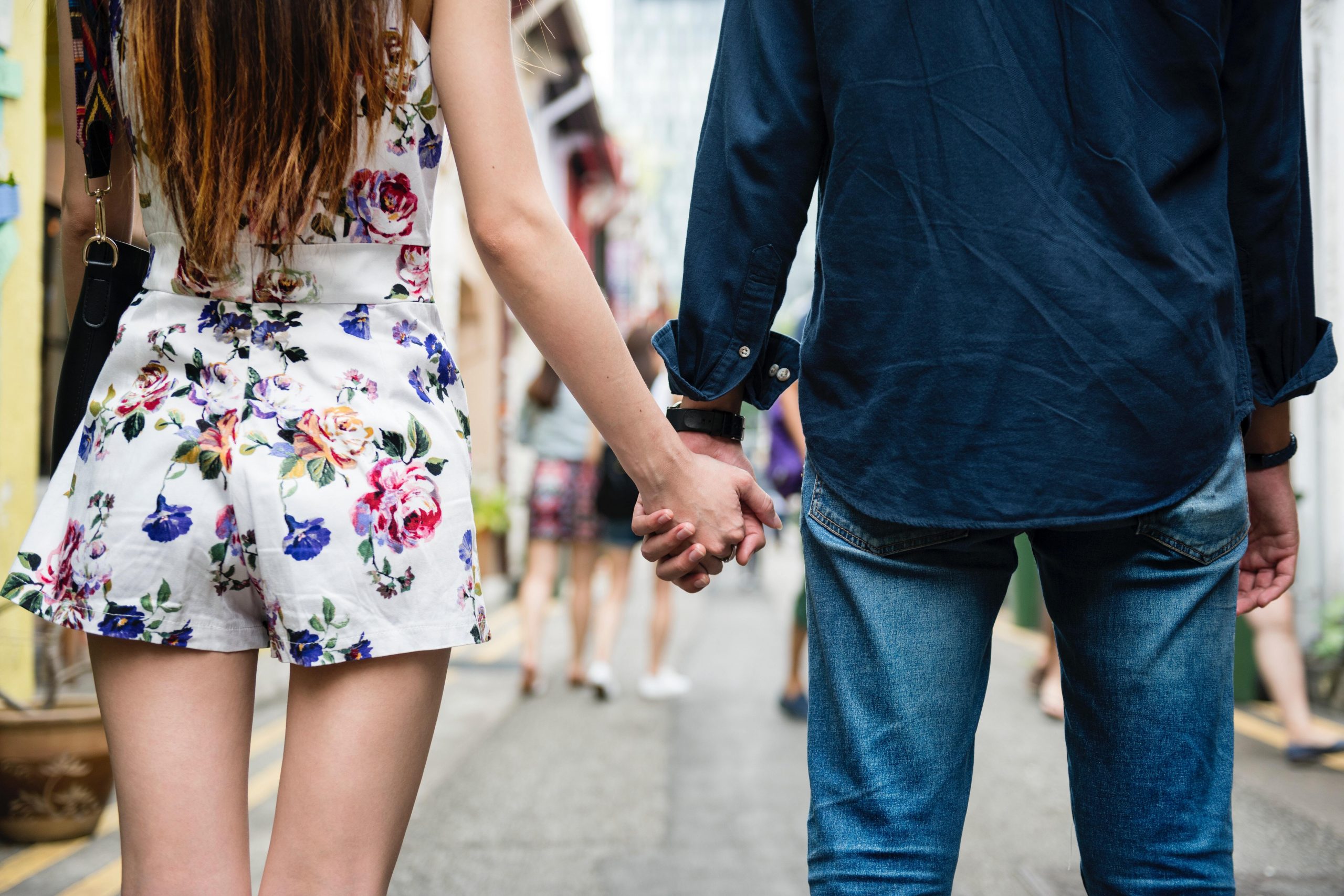 Couple holding hands