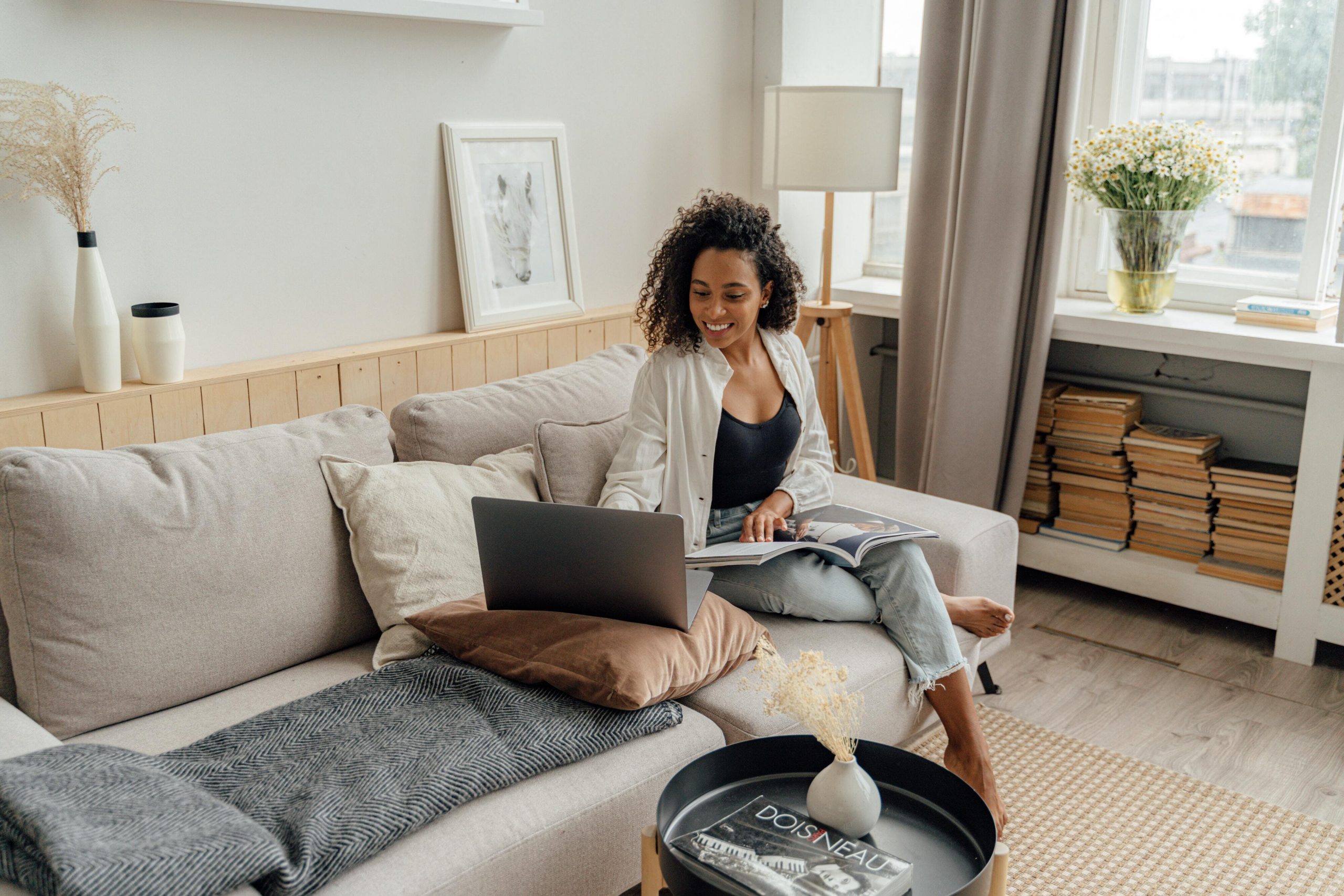 Woman looking at laptop