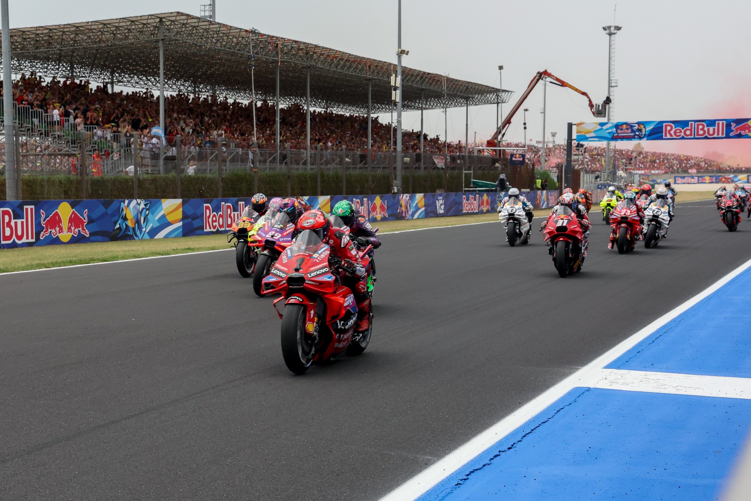 Francesco Bagnaia of Italy and Ducati Lenovo Team leads the racers