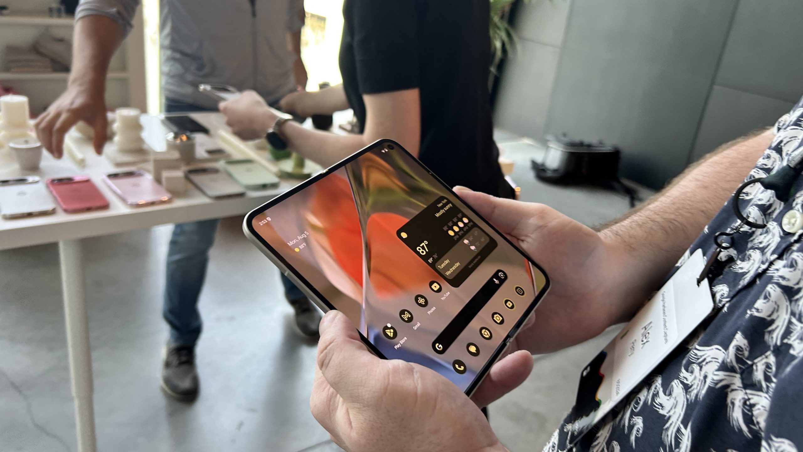 Man holding the Google Pixel 9 Pro Fold with both hands