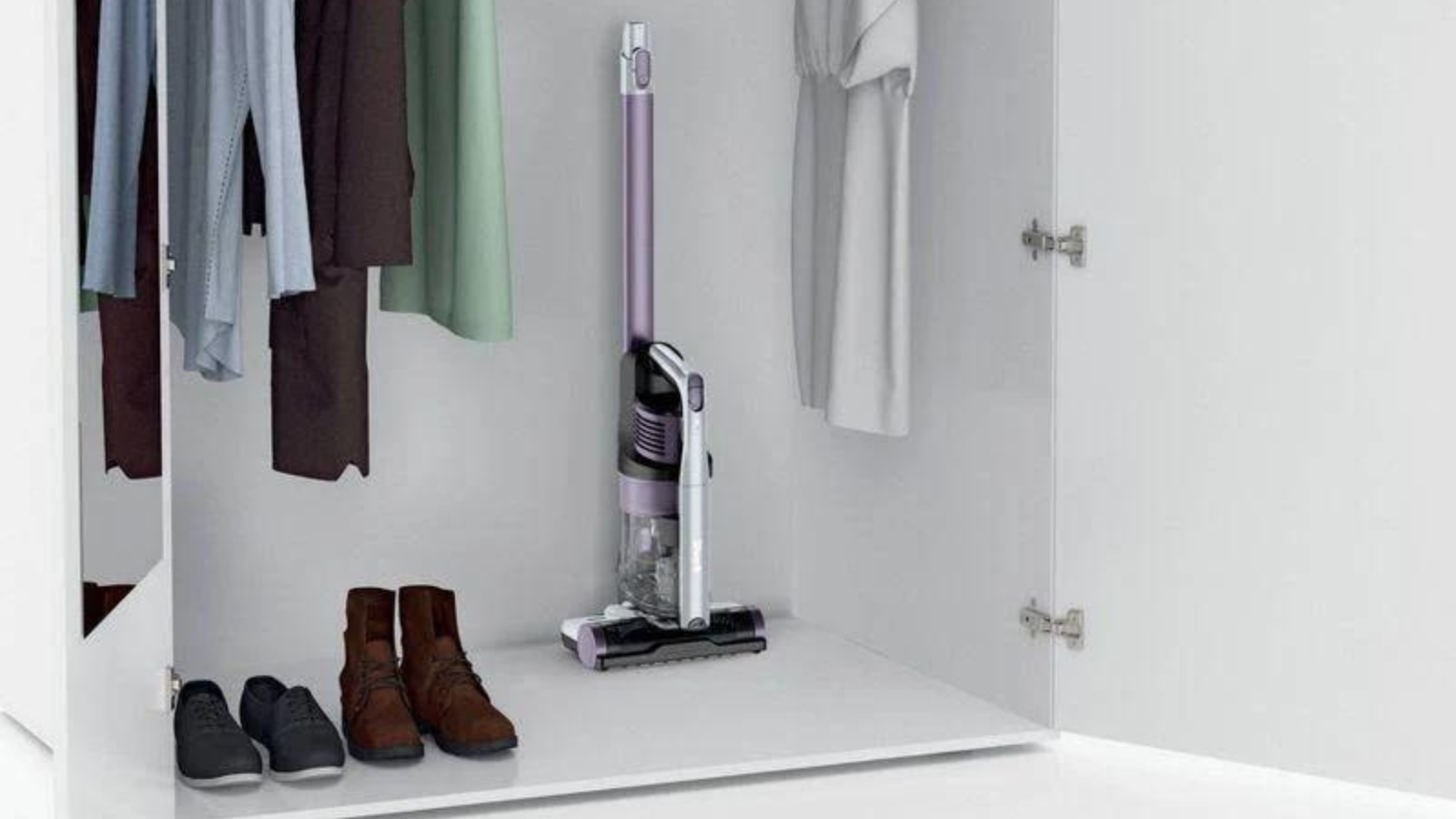 Shark Pet cordless vacuum in white closet next to shoes