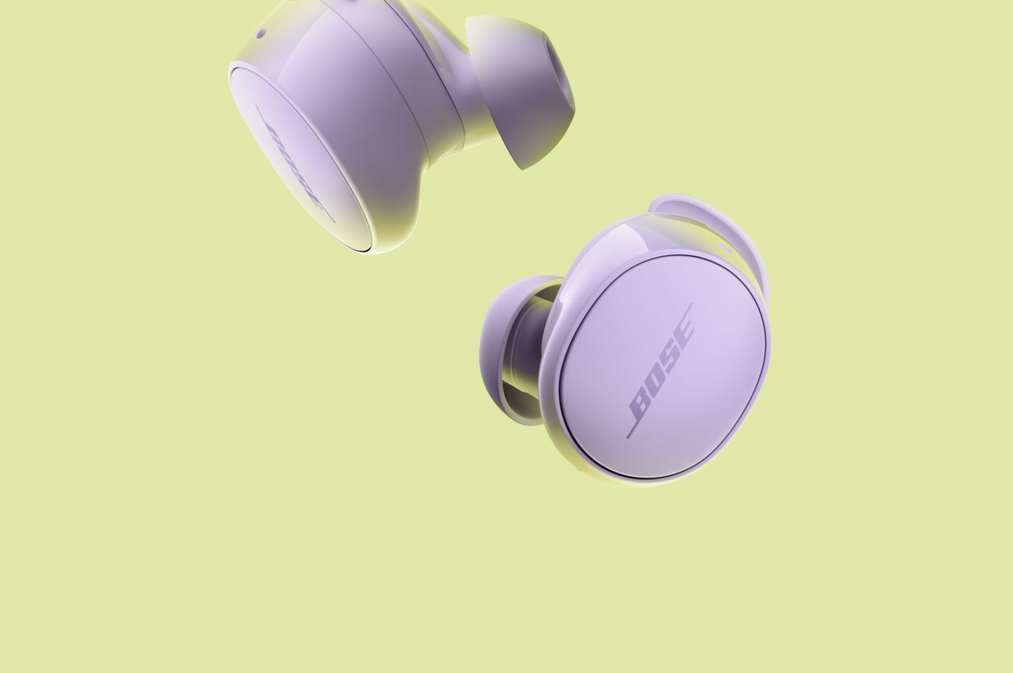 A pair of Bose QuietComfort earbuds in Chilled Lilac.