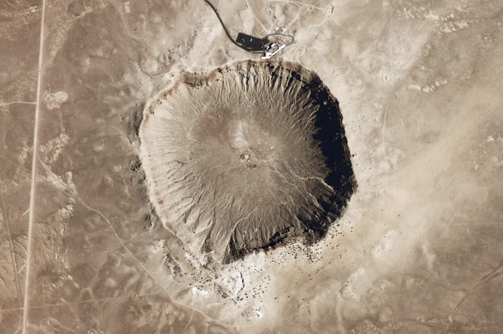 Arizona's 4,000-foot-wide (1,200-meter) Meteor Crater, created by an asteroid only some 150 feet (46 meters) across some 50,000 years ago. 