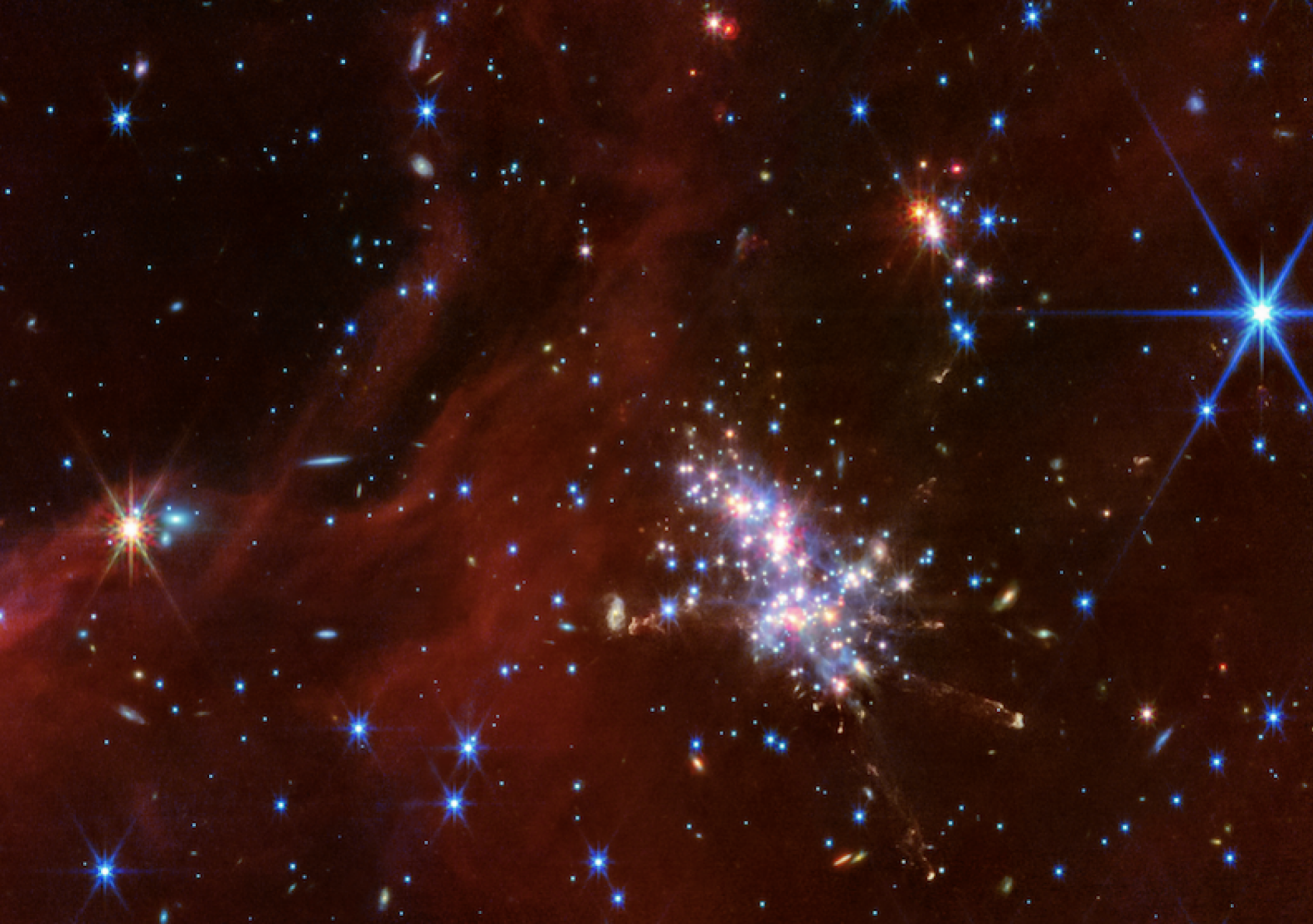 A vibrant star-forming region in the "Extreme Outer Galaxy," as captured by the James Webb Space Telescope.