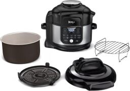 a ninja foodi air fryer pressure cooker combo with its accessories