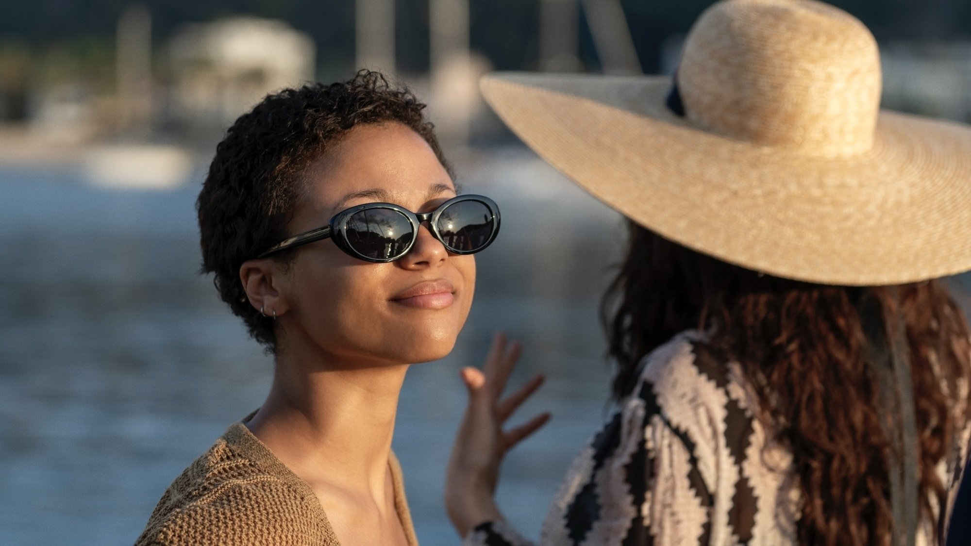 Harper and Yasmin on deck on a yacht.