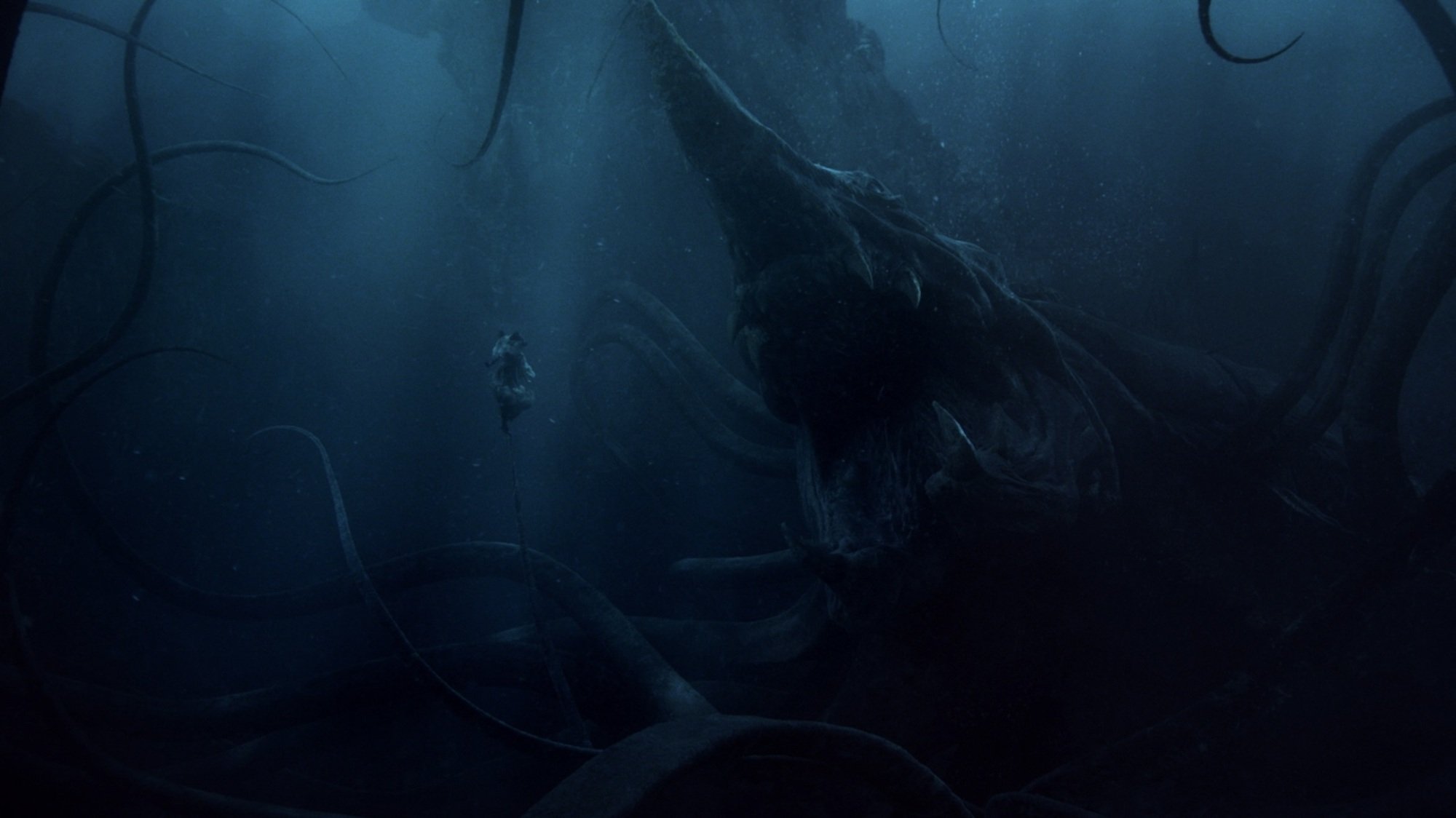 Míriel floats in the depths of the ocean in front of a massive sea monster.