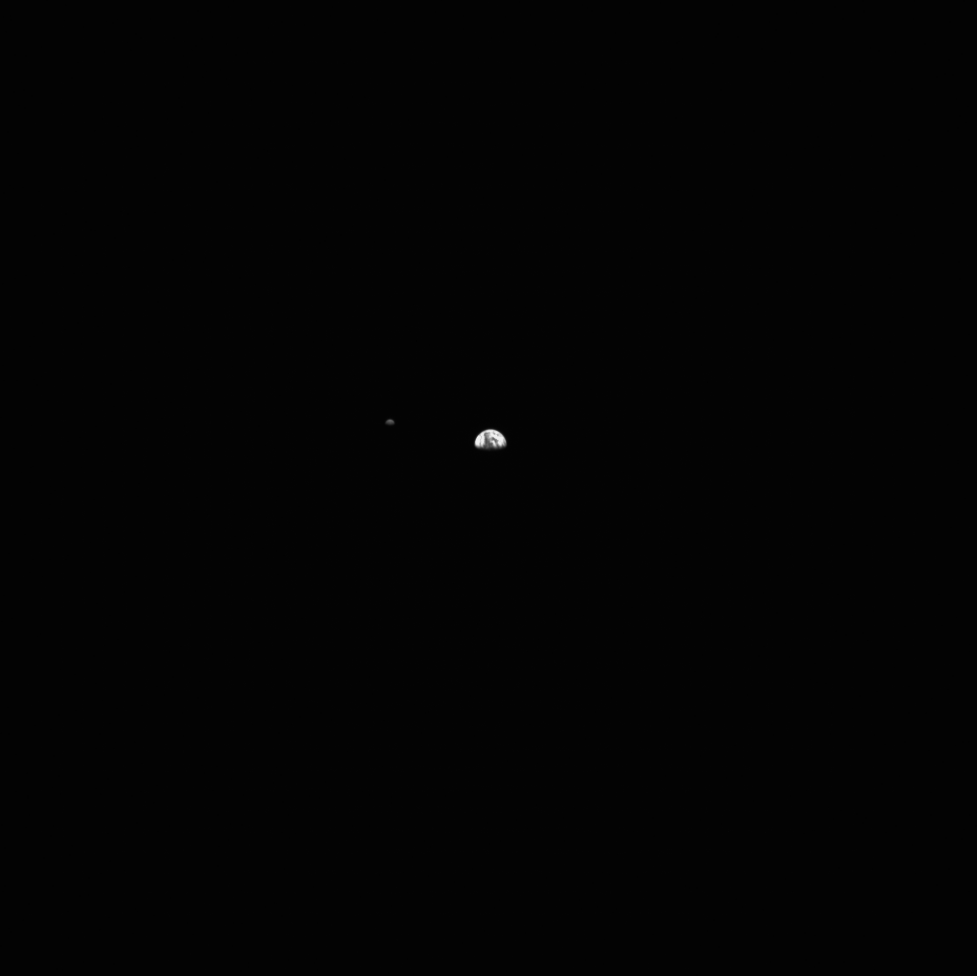 Earth (on right) and the moon as seen from over 3.1 million miles (over 5 million kilometers) away.