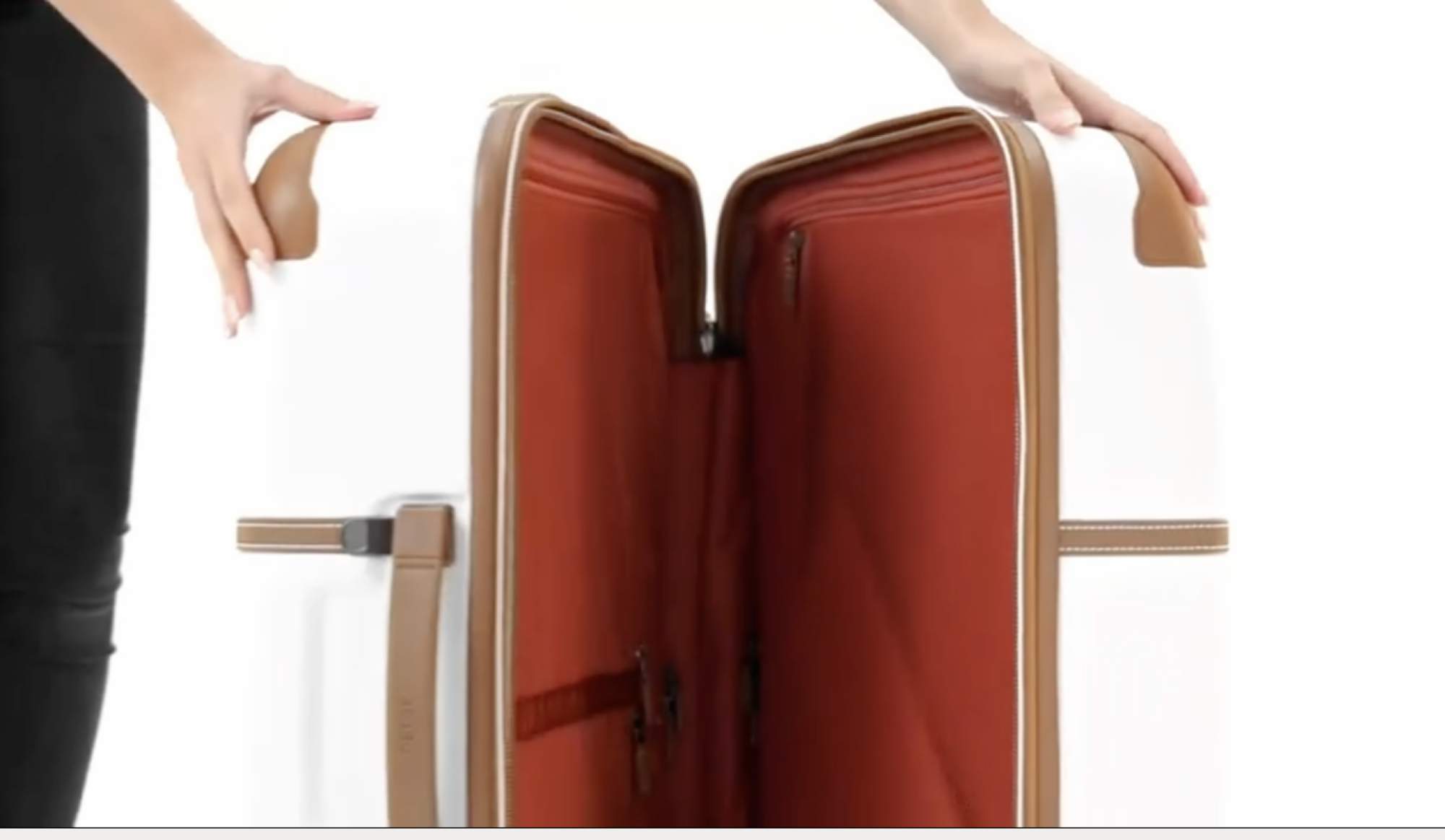 person opening luggage