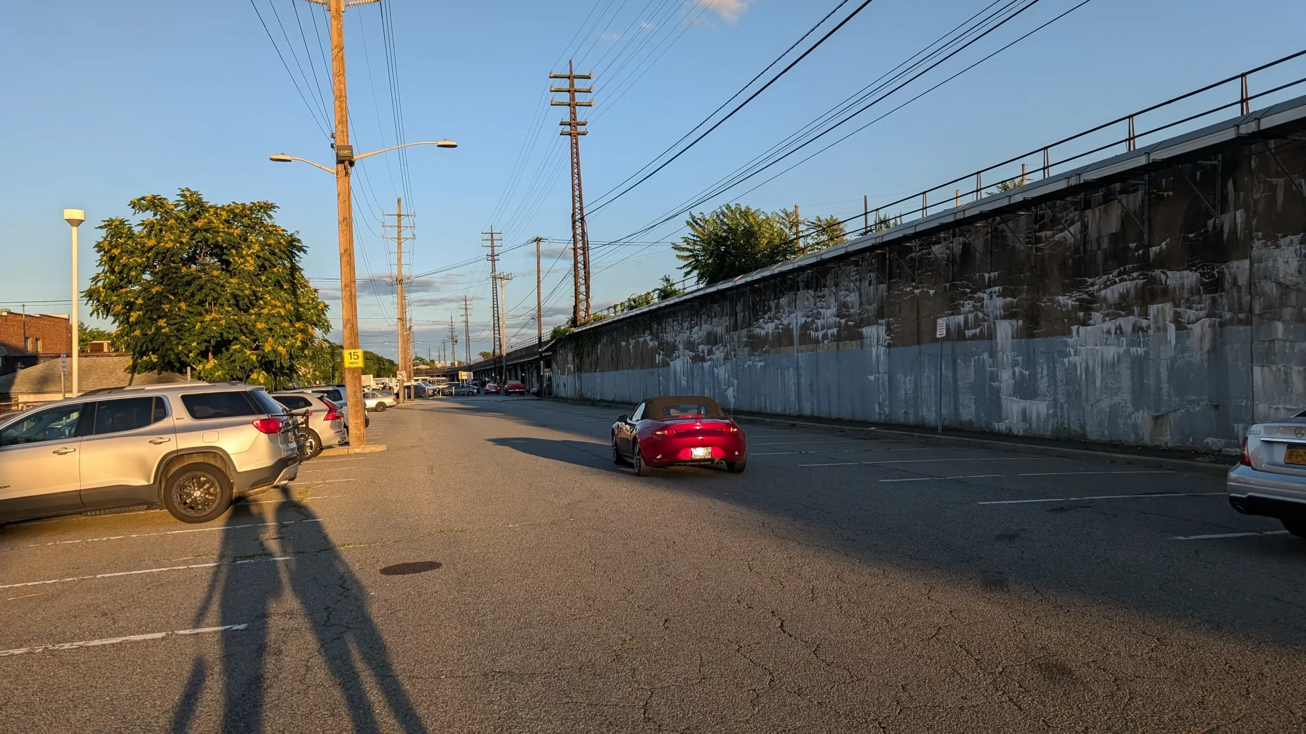 Red car in a parking lot