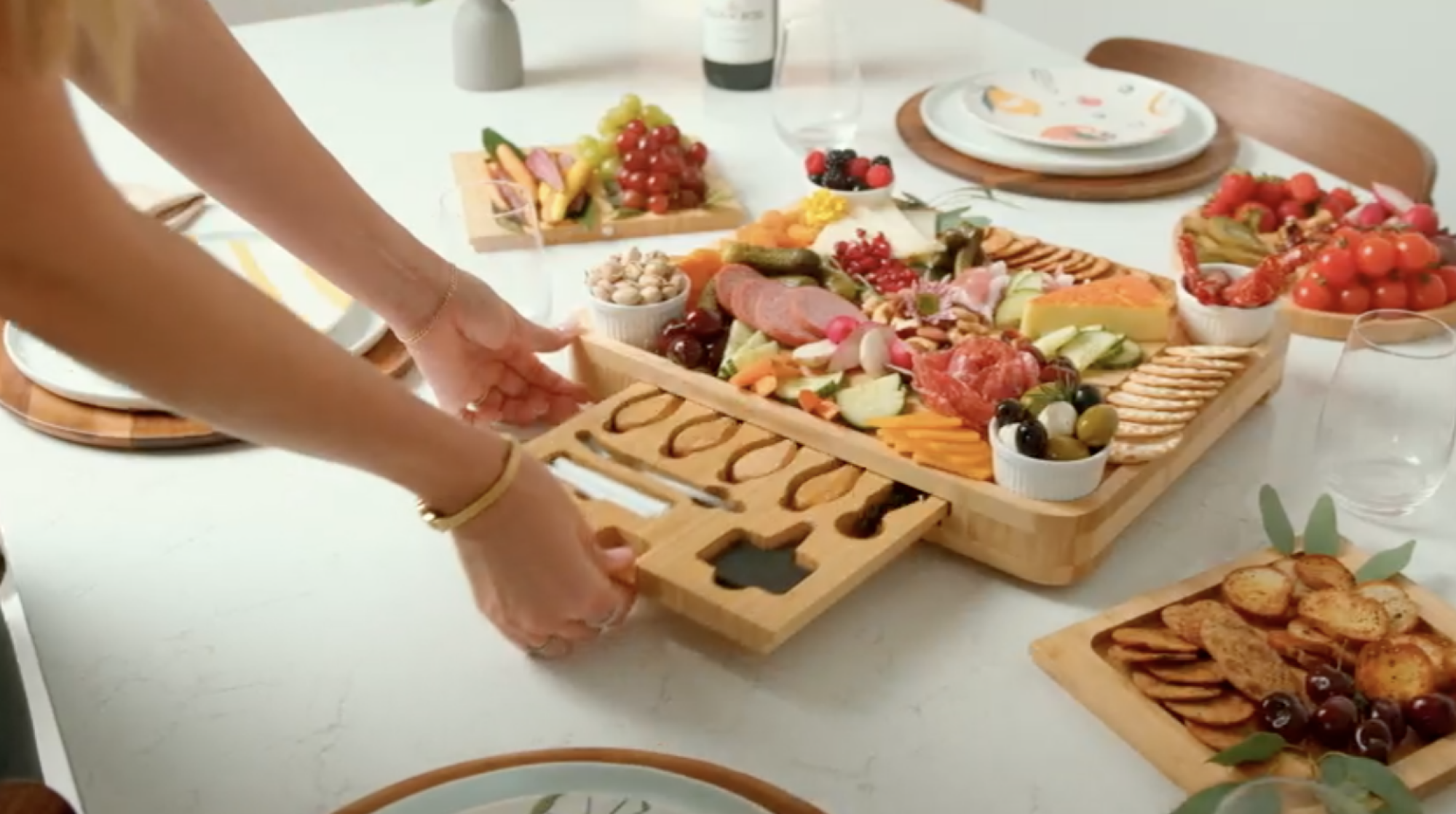 person opening charcuterie board drawer