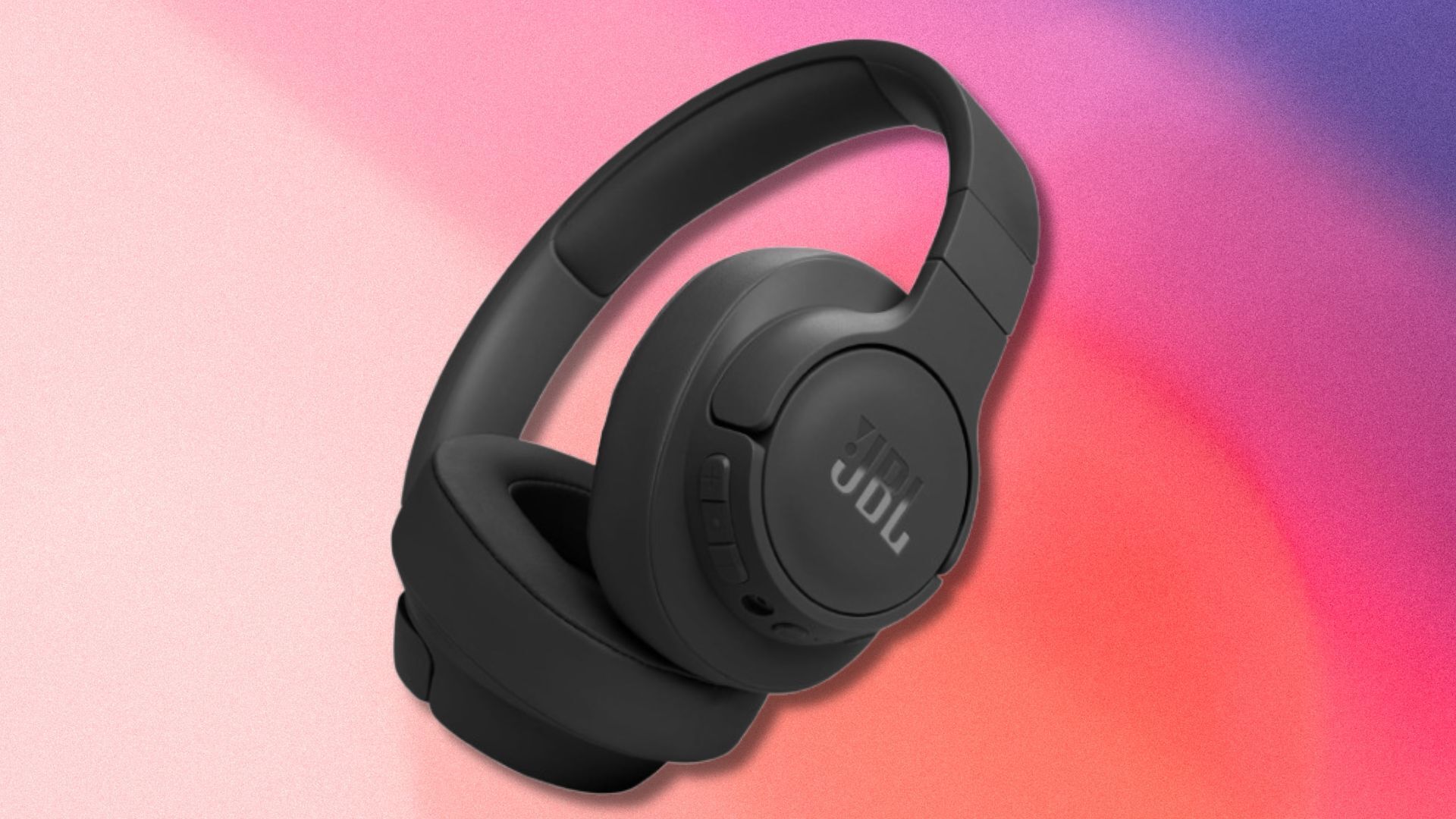 black jbl tune 770nc headphones on a light pink and purple gradient background