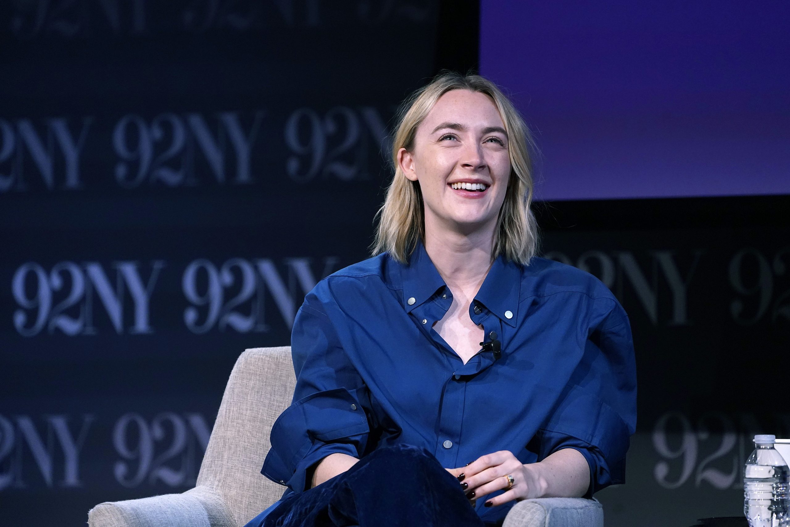 saoirse ronan onstage at a panel