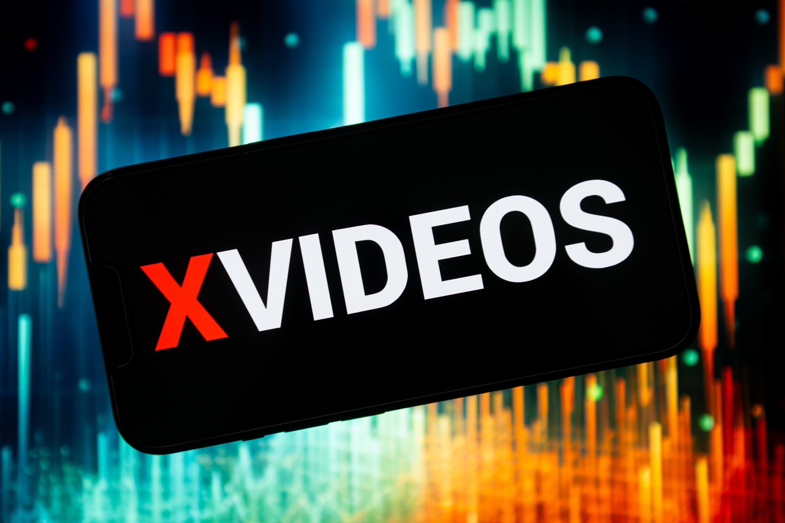 In this photo illustration a Xvideos logo seen displayed on a smartphone