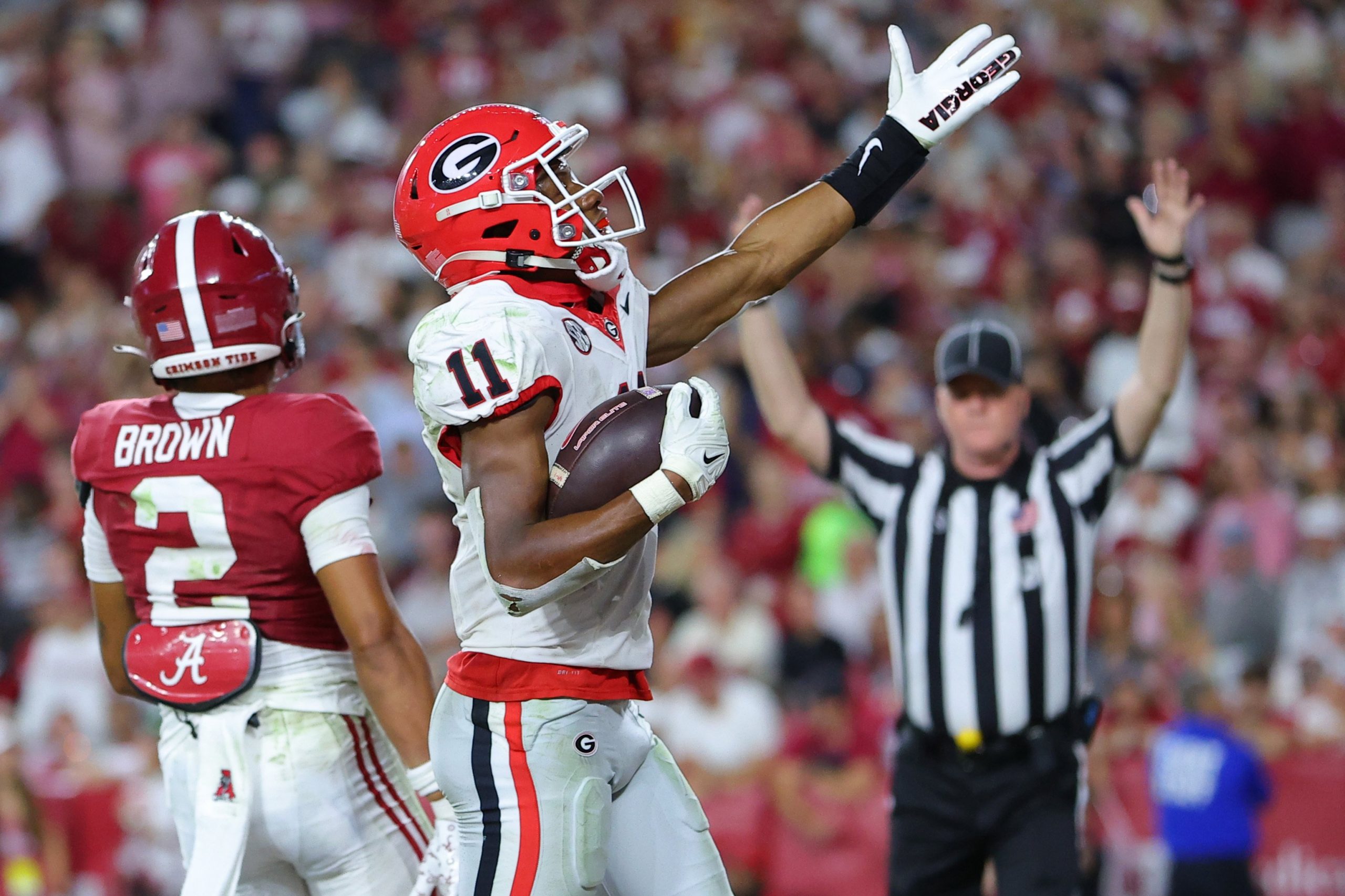 Arian Smith #11 of the Georgia Bulldogs celebrates after his touchdown reception against the Alabama Crimson Tide during the third quarter at Bryant-Denny Stadium on Sept. 28, 2024, in Tuscaloosa, Alabama. 