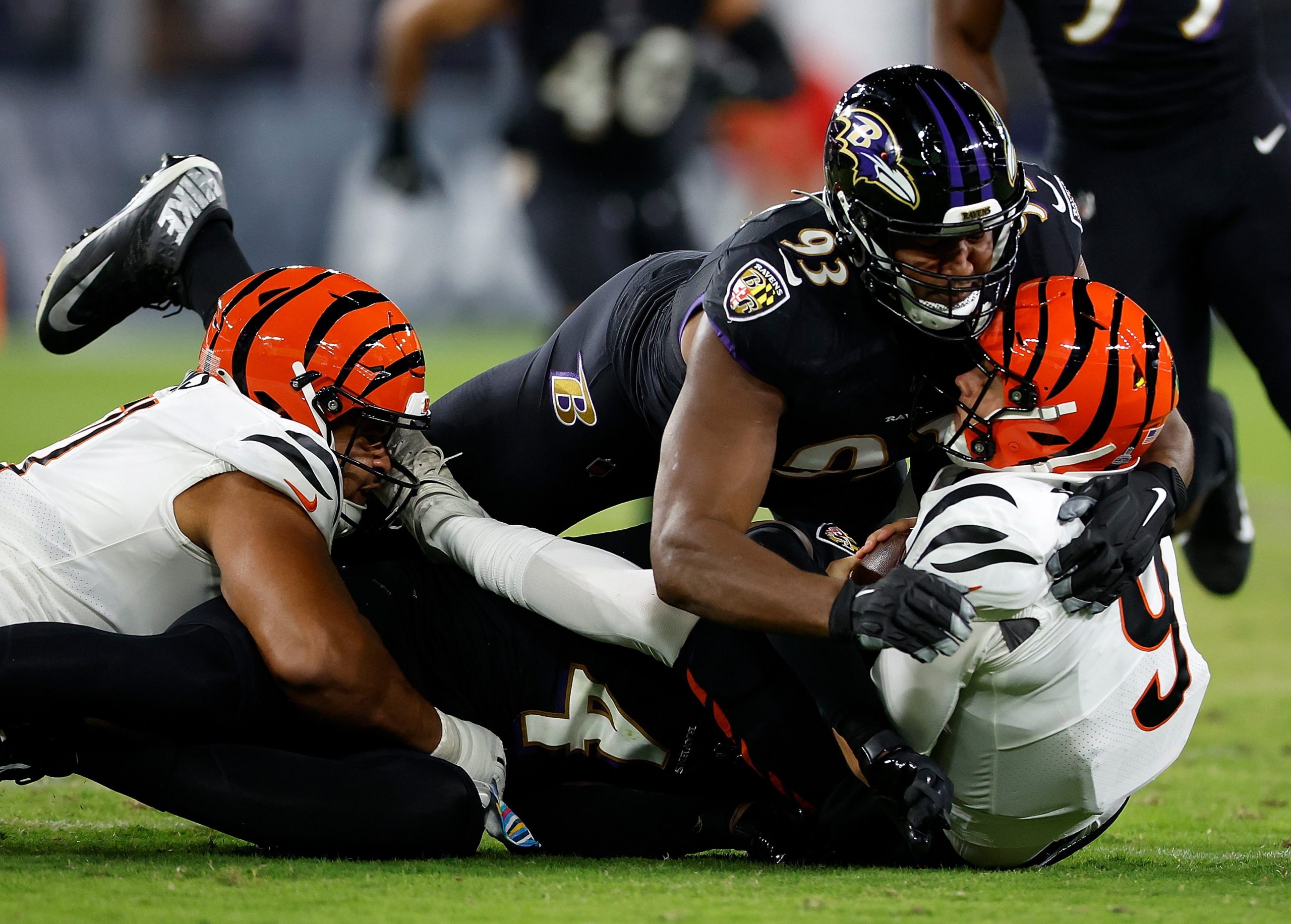 oe Burrow of the Cincinnati Bengals is sacked by the Ravens