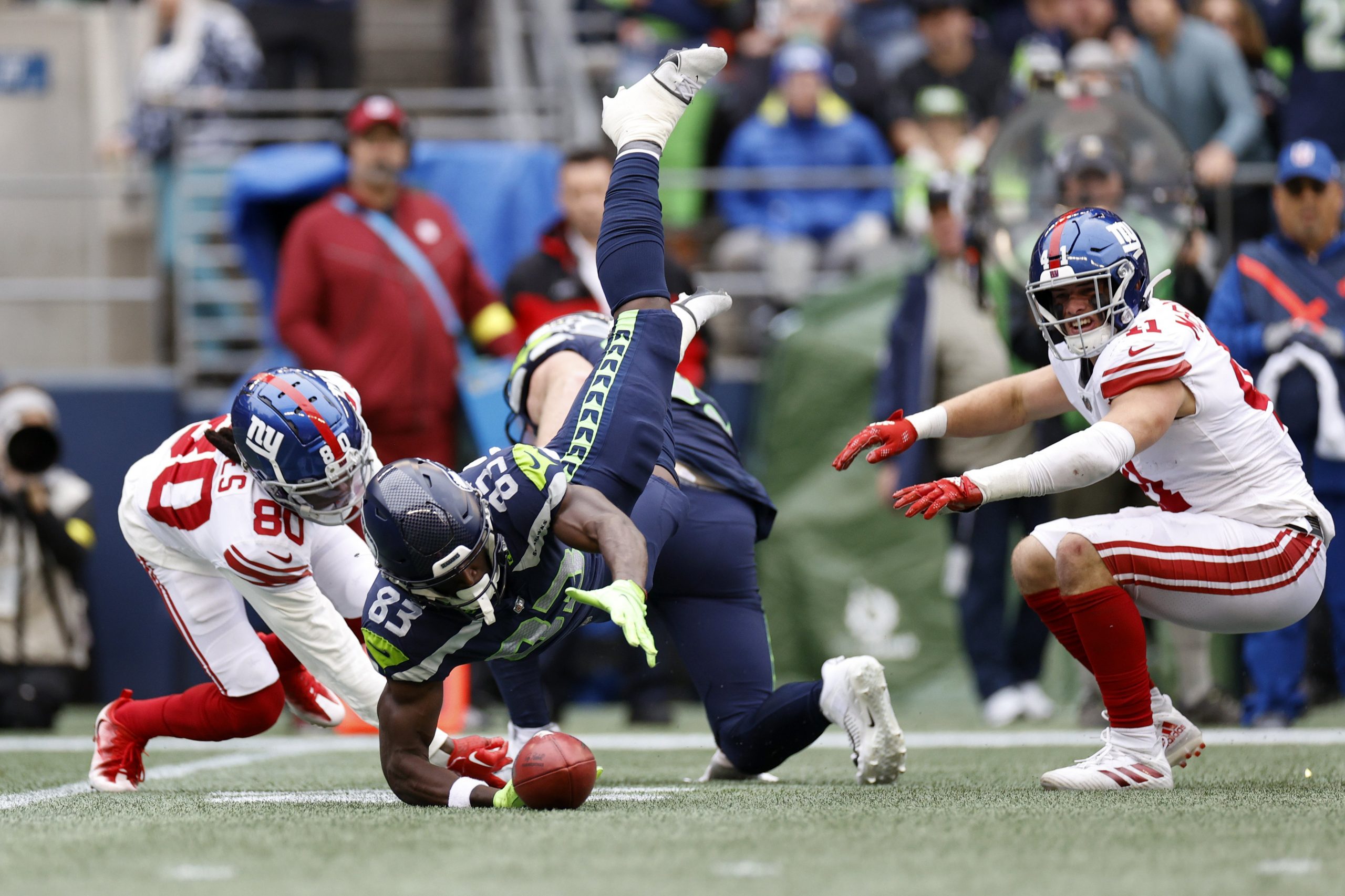 Dareke Young of the Seattle Seahawks grabs a fumble