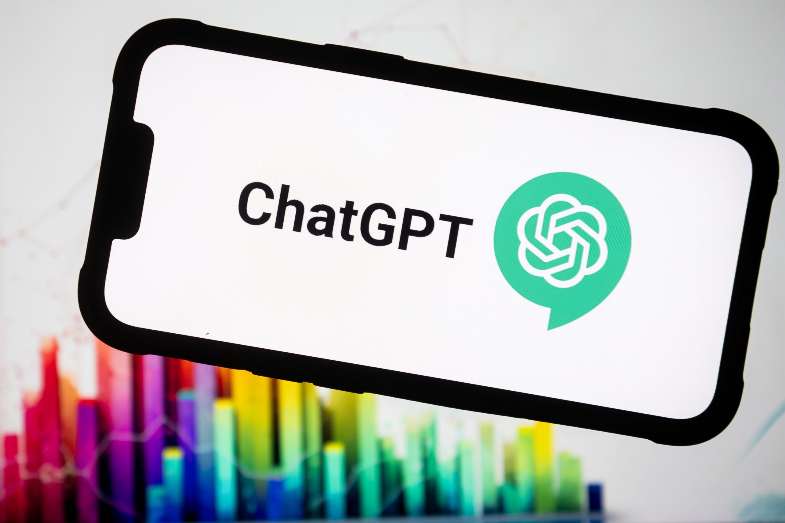 In this photo illustration, the Chat GPT logo seen displayed on a smartphone