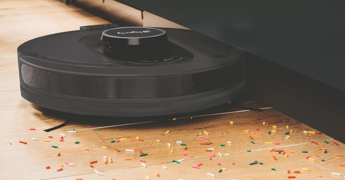 Shark AI ultra robot vacuum vacuuming colorful sprinkles 