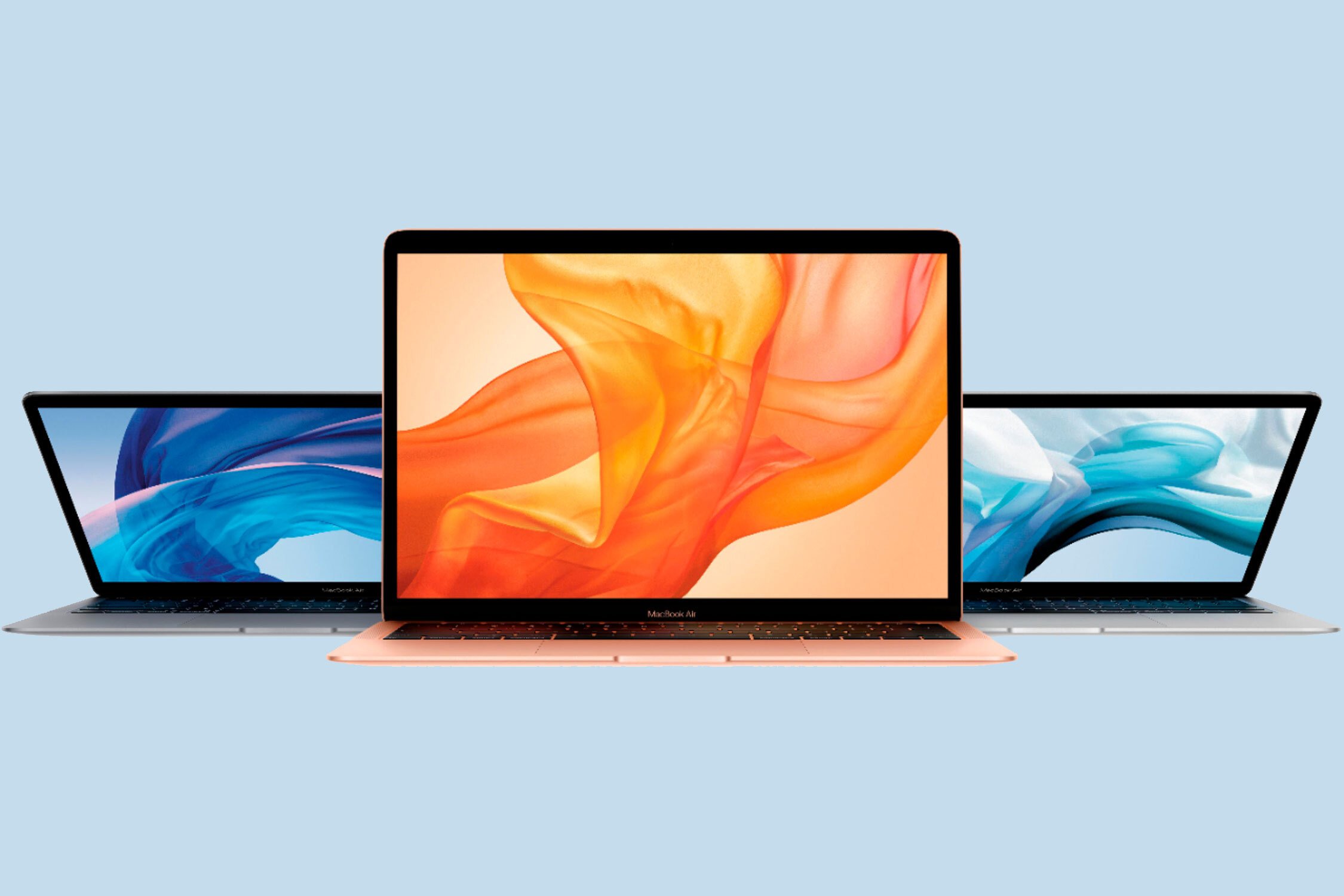 three Apple MacBook Airs in a row