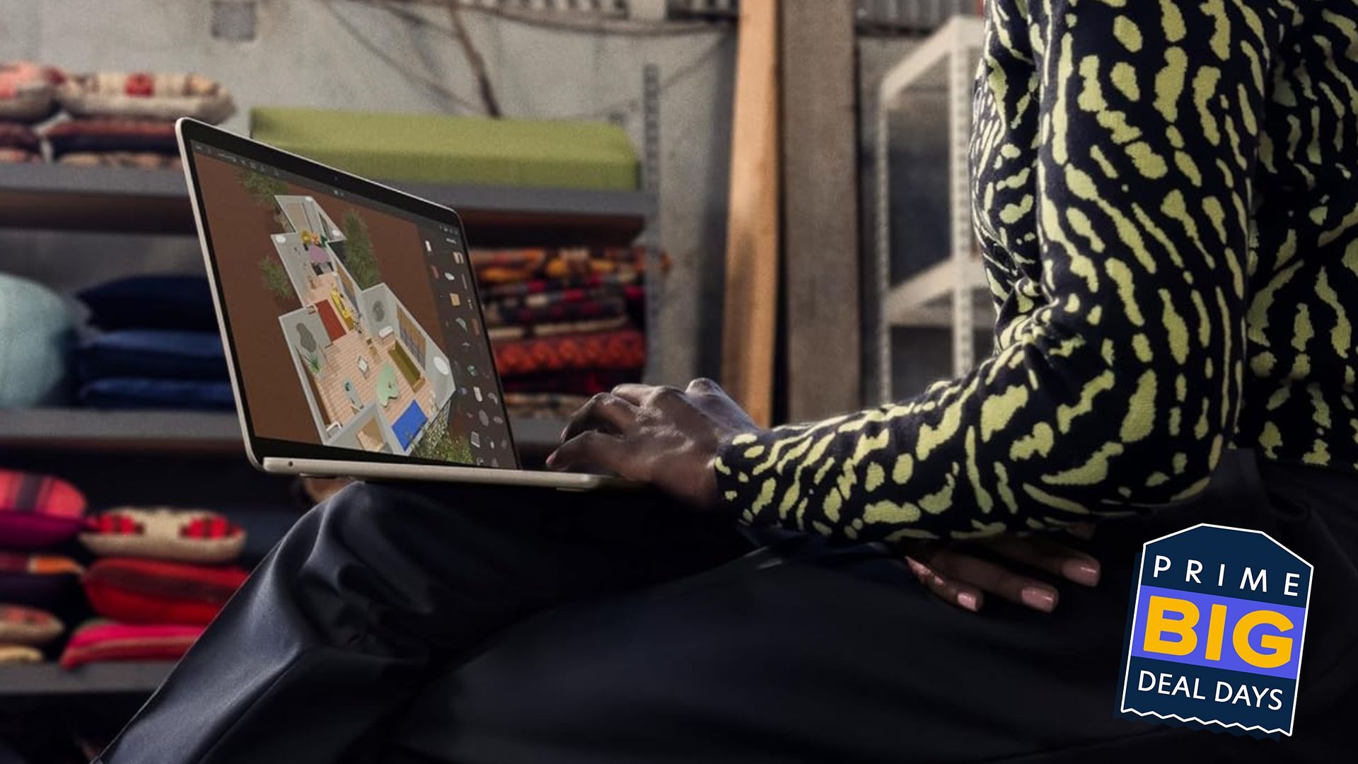 fashionable young person typing on m3 macbook air; badge over image reads 'Prime Big Deal Days'