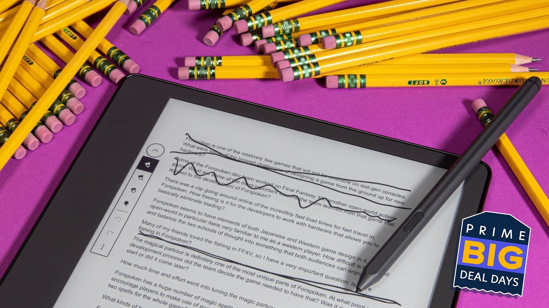 close-up view of kindle scribe with notes on screen and pile of pencils nearby