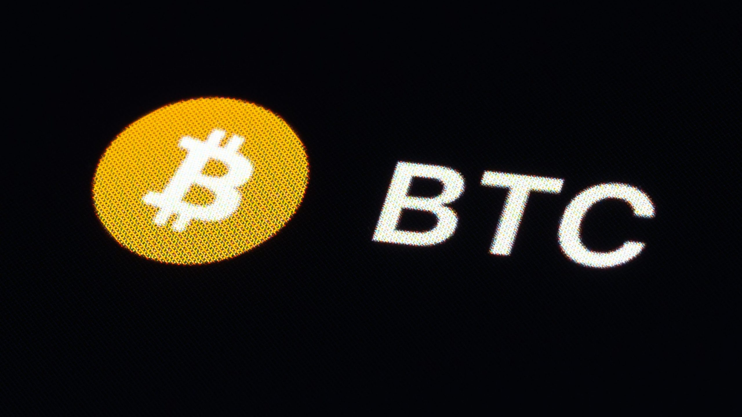 bitcoin logo on black background