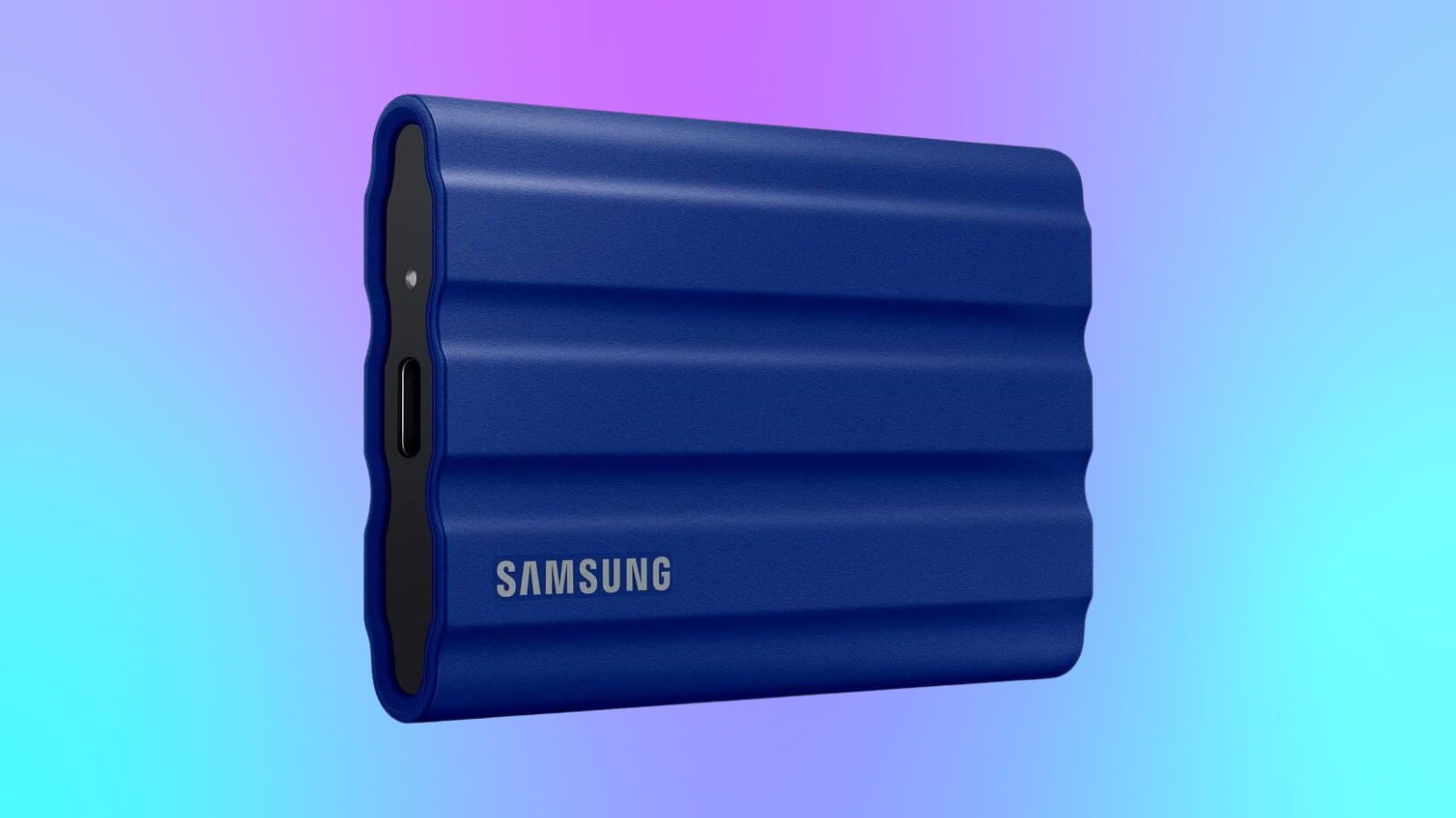 Samsung T7 Shield 2 TB on a blue/purple gradient background