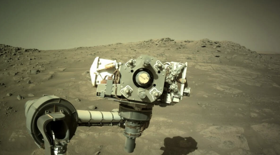 The Perseverance rover peering onto the Martian landscape.