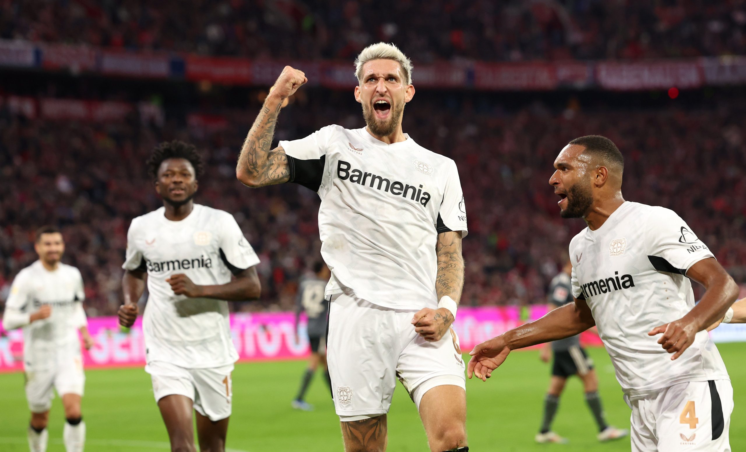 Robert Andrich of Bayer 04 Leverkusen celebrates