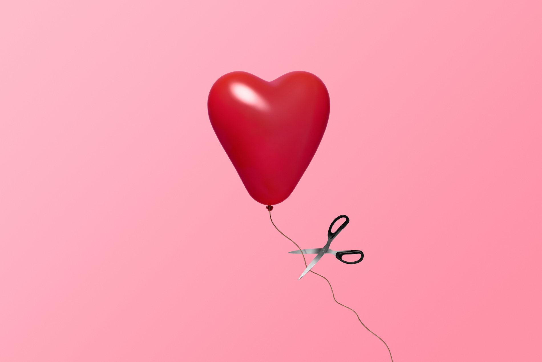 Illustration of a heart balloon having its string cut. 