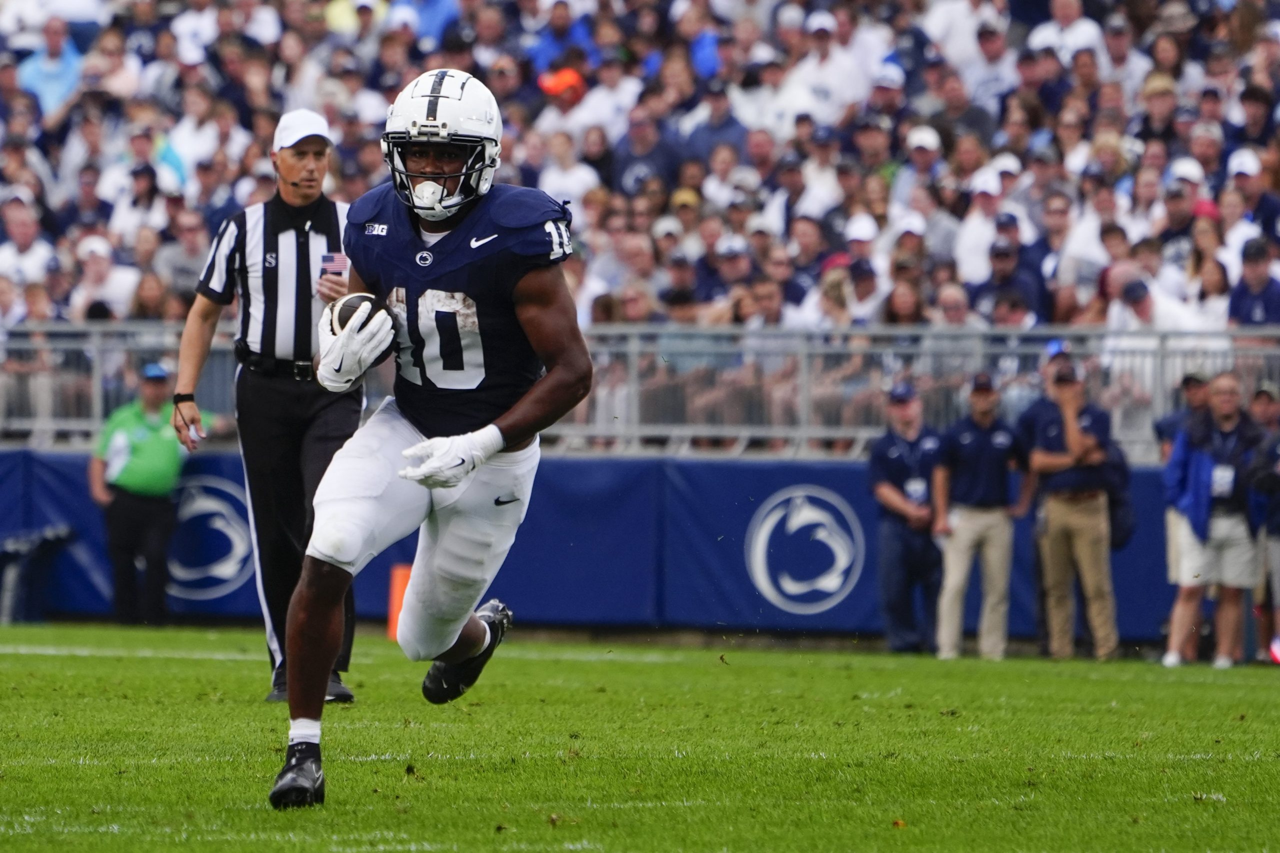 Penn State Nittany Lions Running Back Nicholas Singleton (10) runs with the ball 