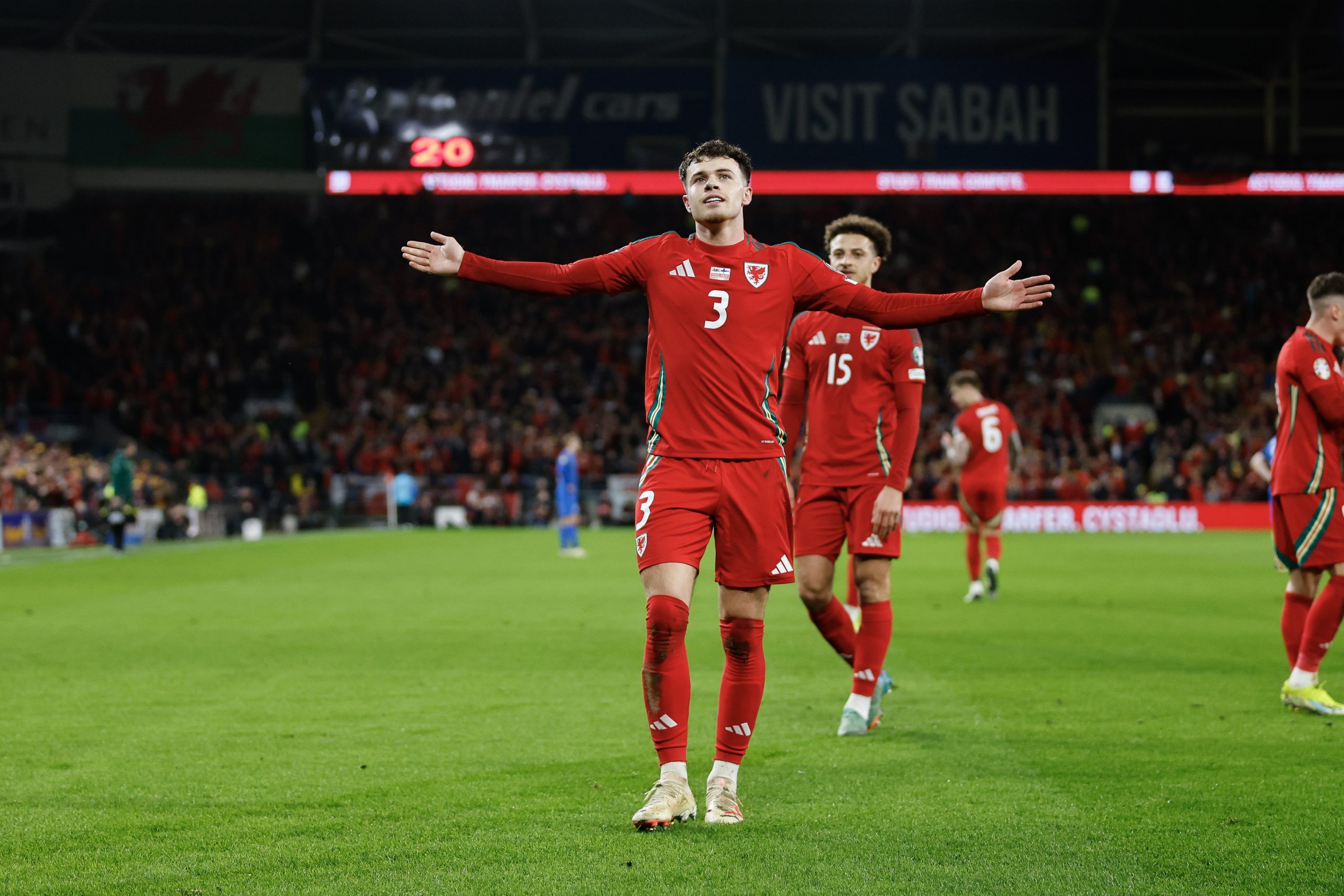 Neco Williams of Wales celebrates after scoring a goal t