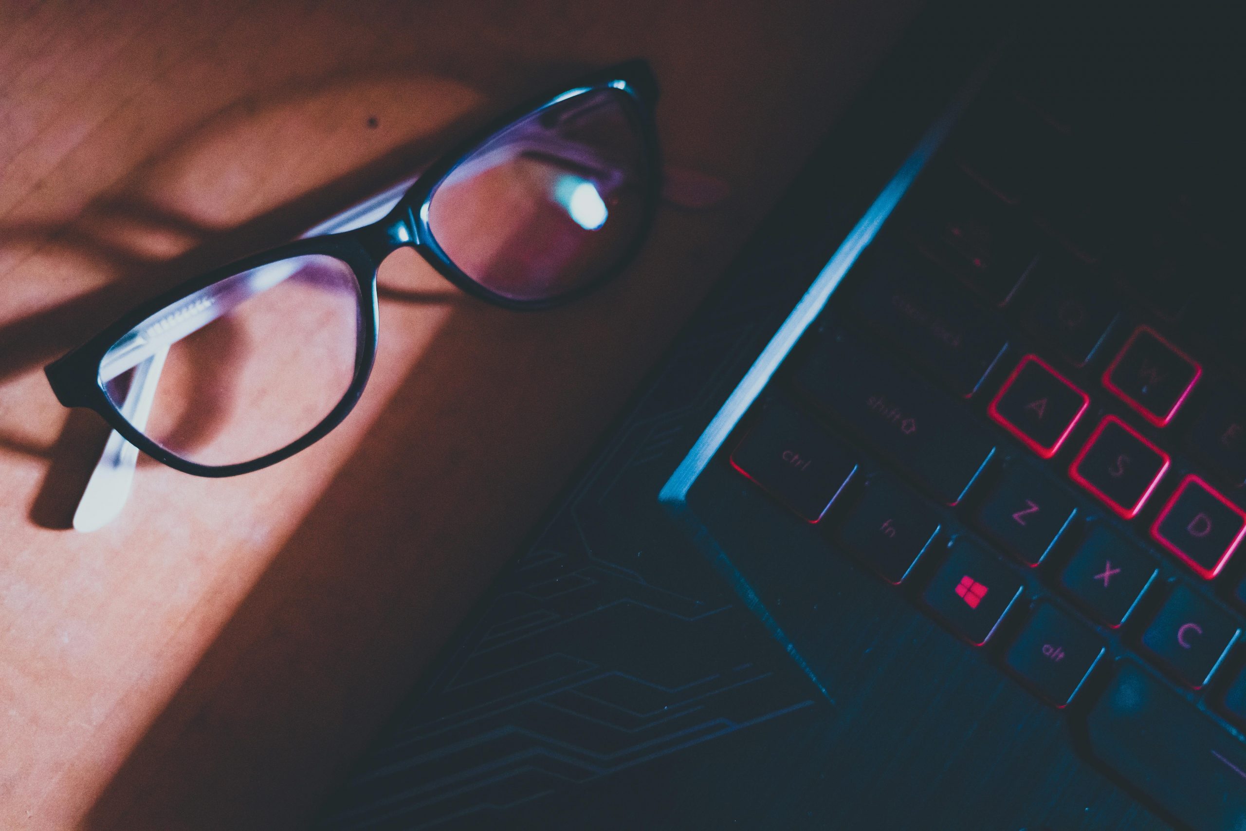 Glasses and keyboard