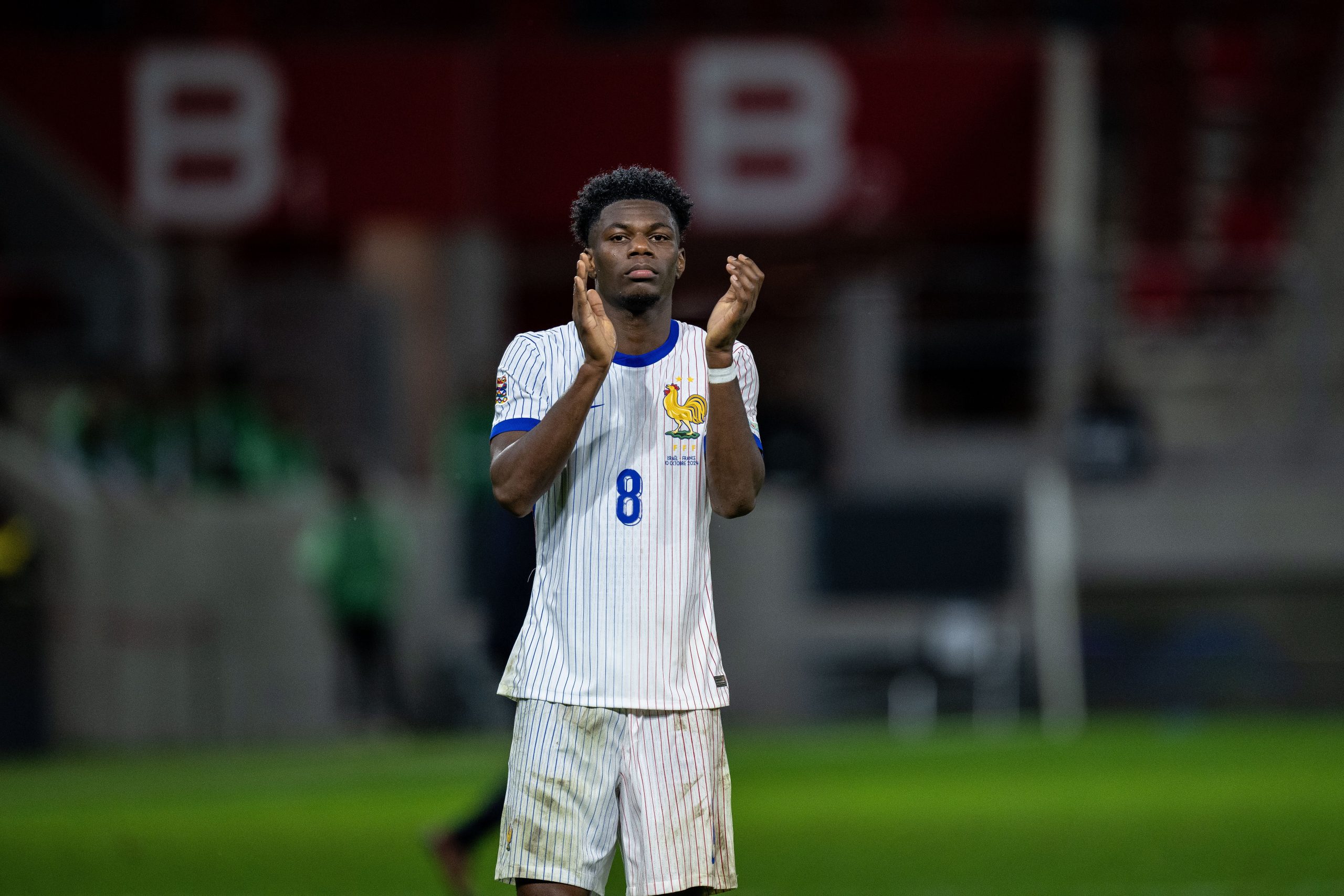 Aurelien Tchouameni of France applauds fans