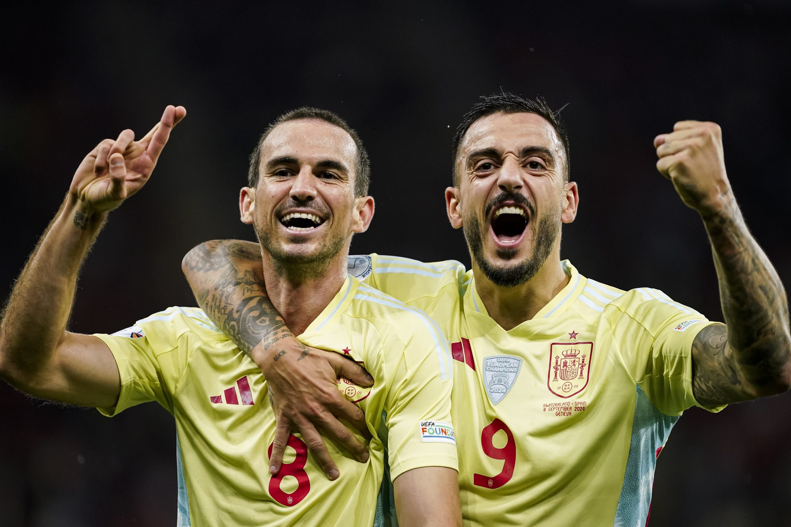 Fabián Ruiz of Spain celebrating his goal with his teammate Joselu Sanmartín